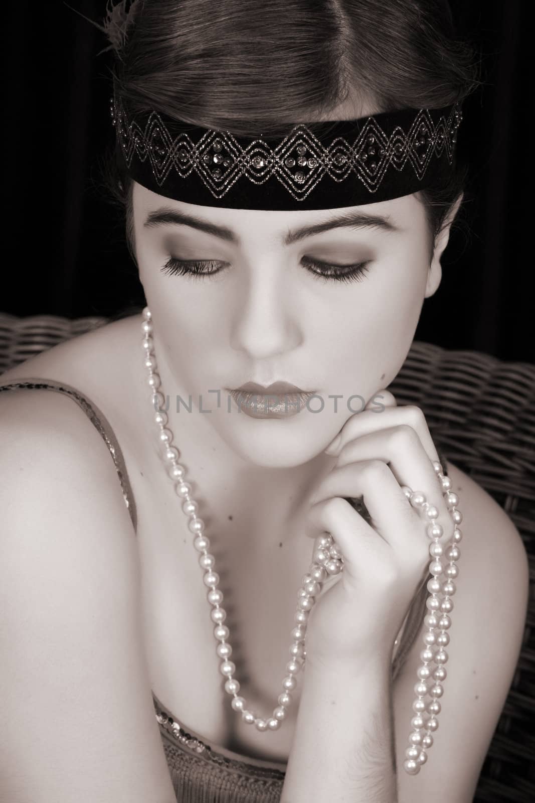 Beautiful young female in 1920 style attire