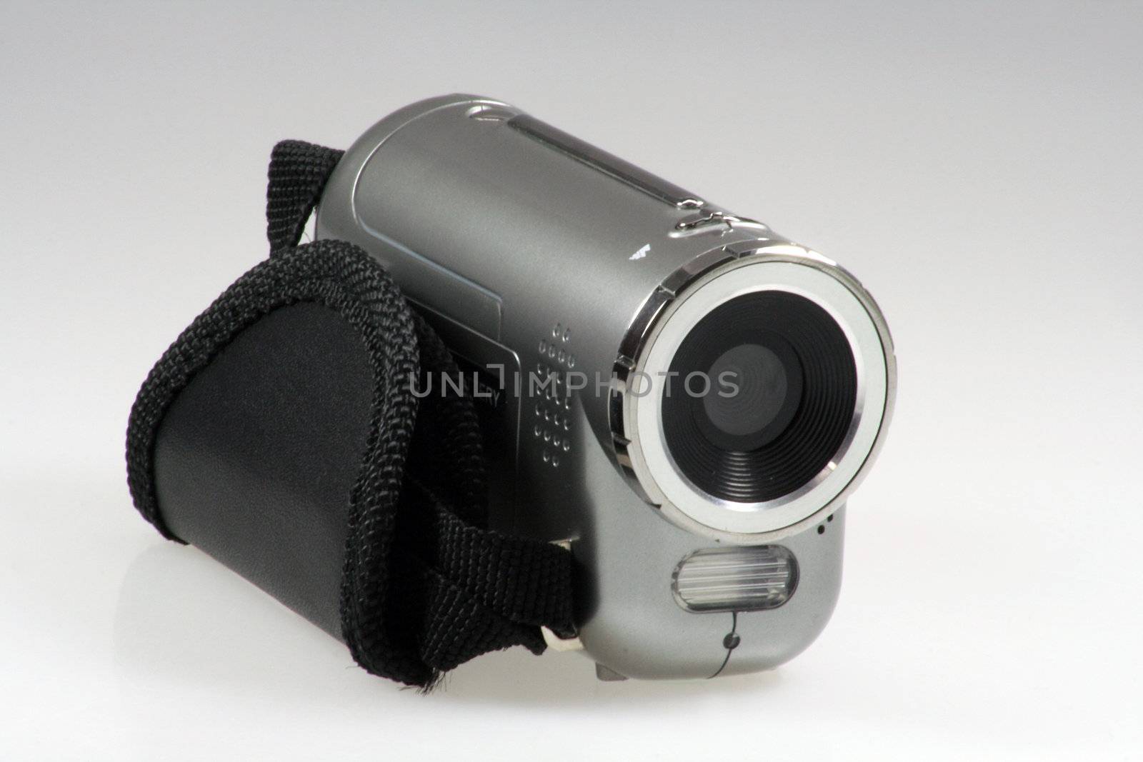 Small silver digital Camera with flashlight