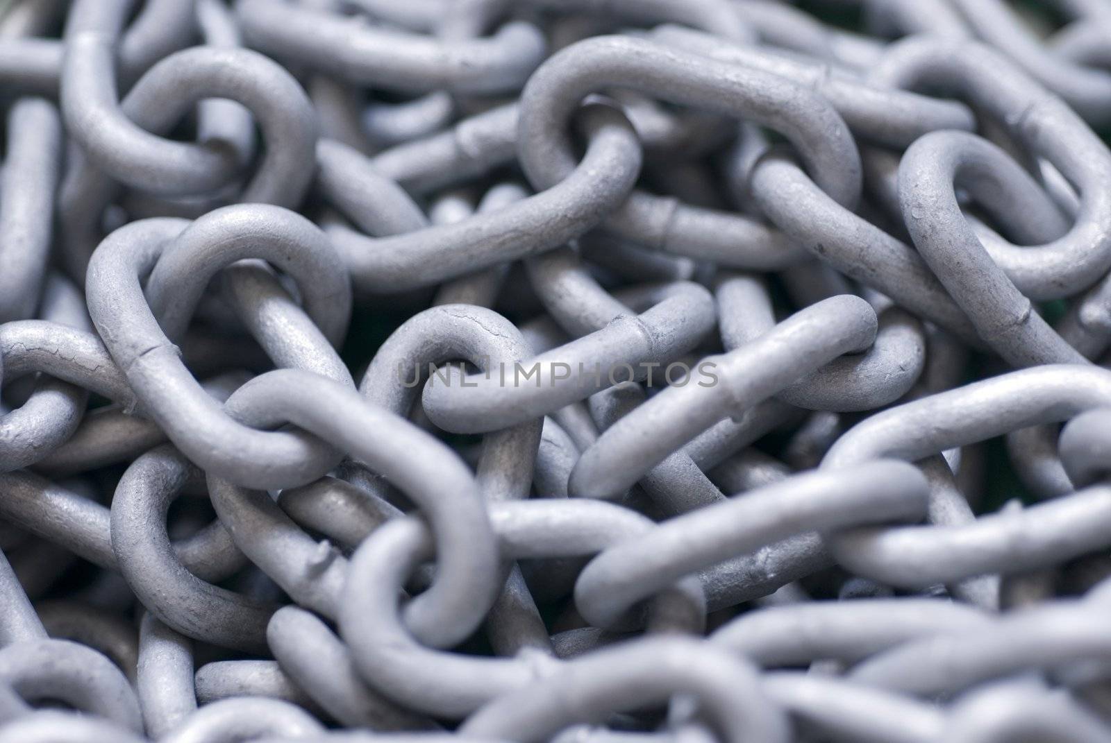 a tangled backdrop of metal chain links