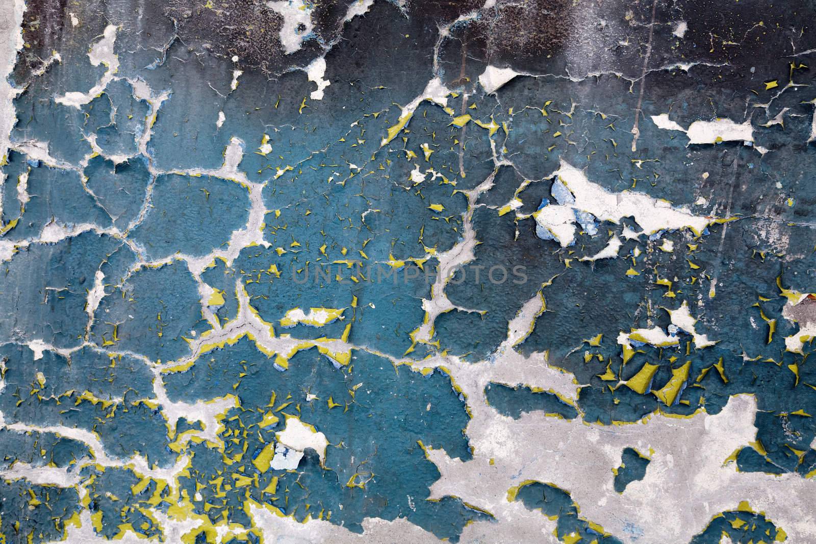 The painted peeled old weathered wall background