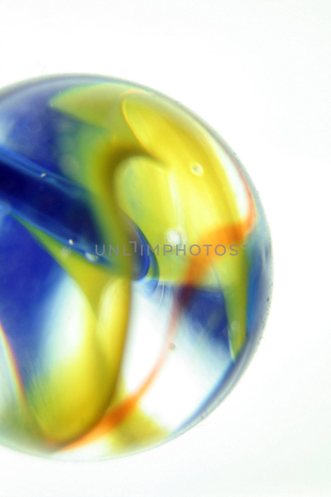 nice coloured marbles on a bright background