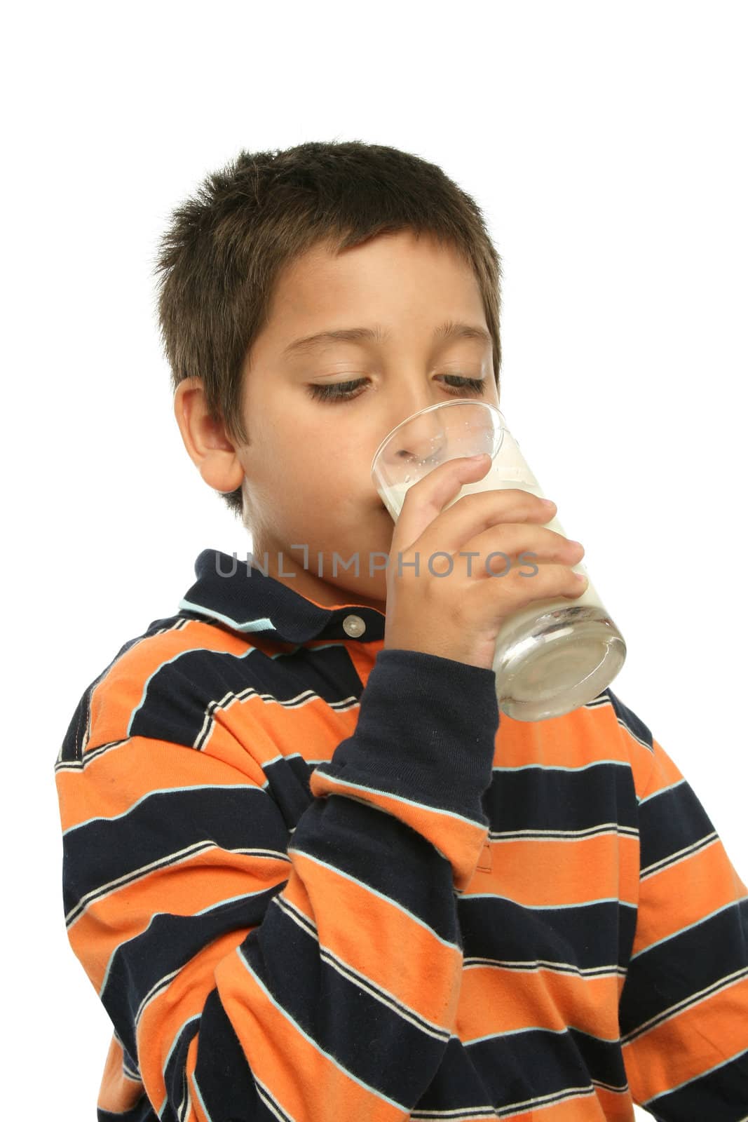 Boy drinking a glass of milk by Erdosain