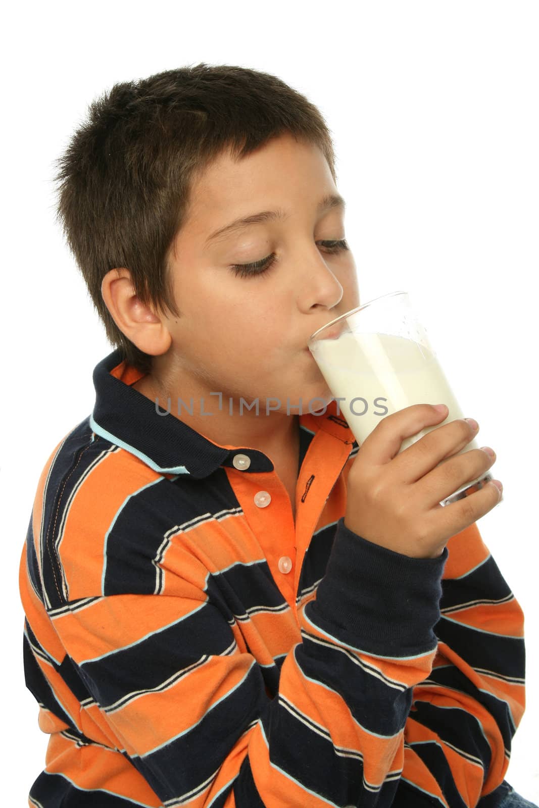 Boy drinking a glass of milk by Erdosain