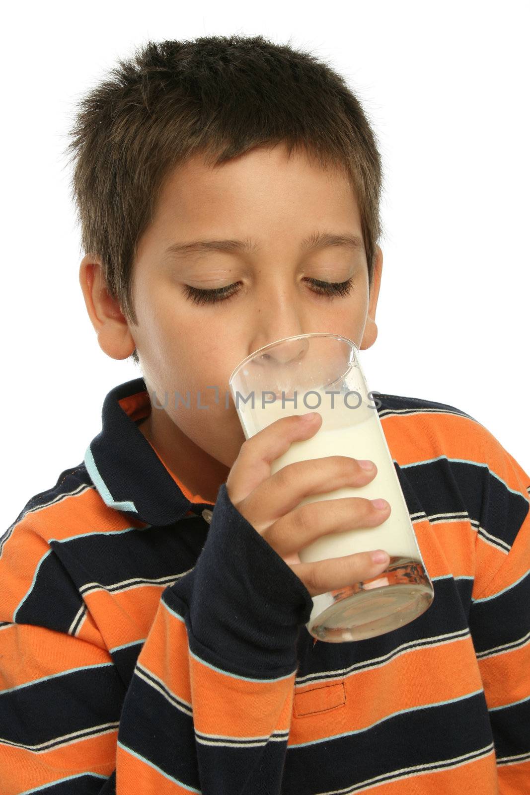 Boy drinking a glass of milk by Erdosain