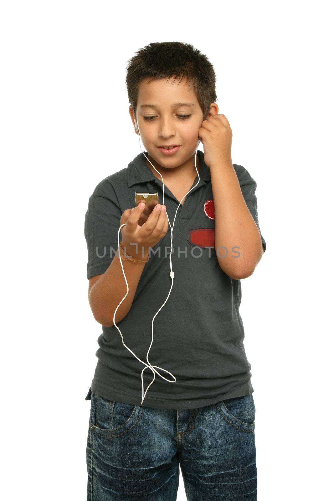 Boy listening music with a mp4 player, white background