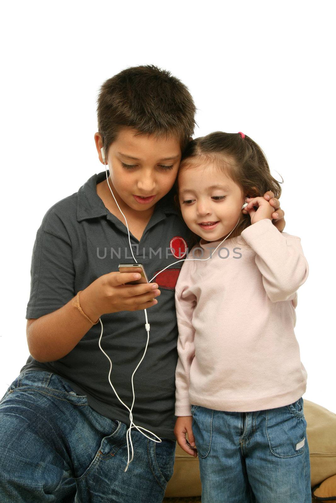 Brother and sister sharing a mp4 player