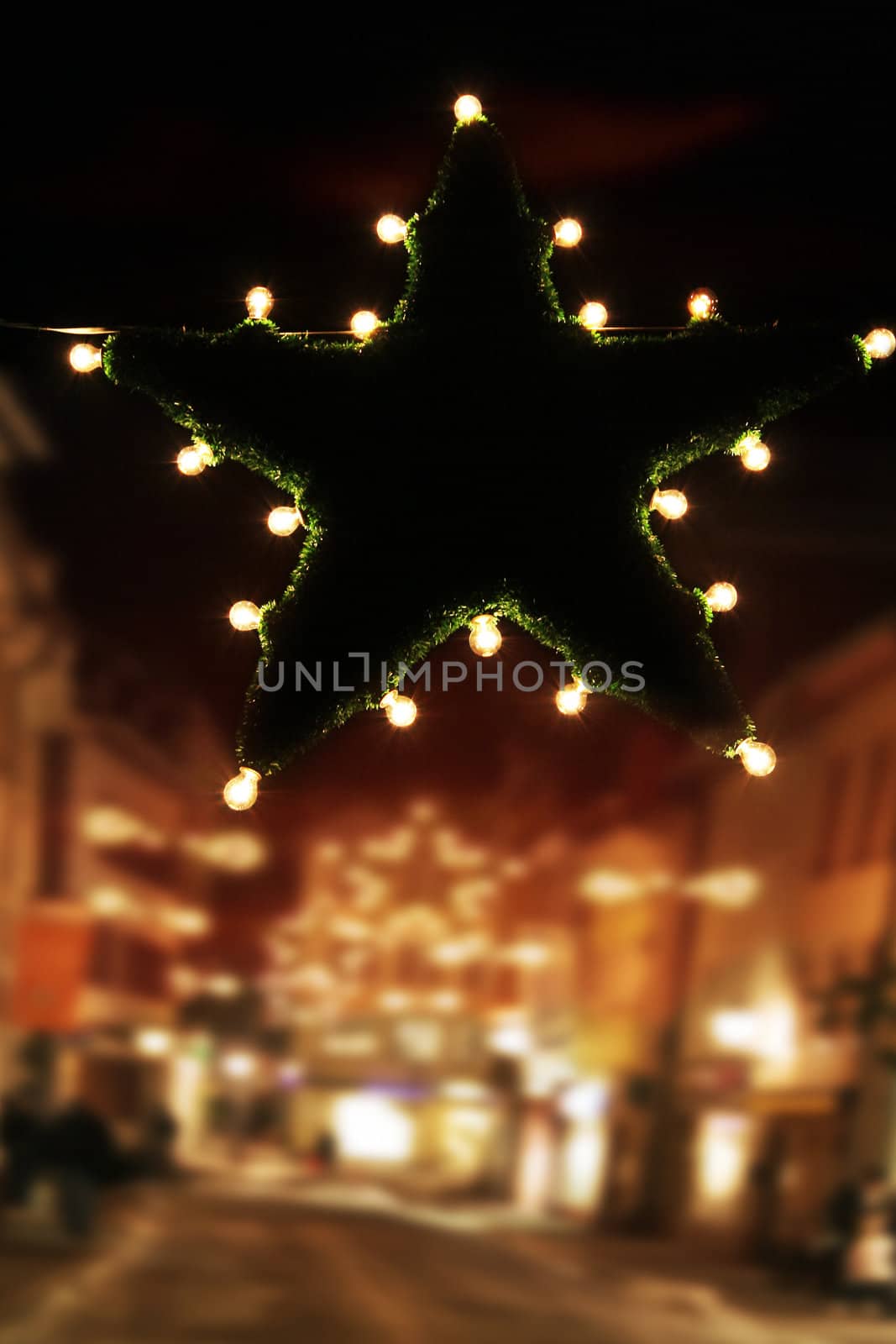 bright christmas star in the dark streets