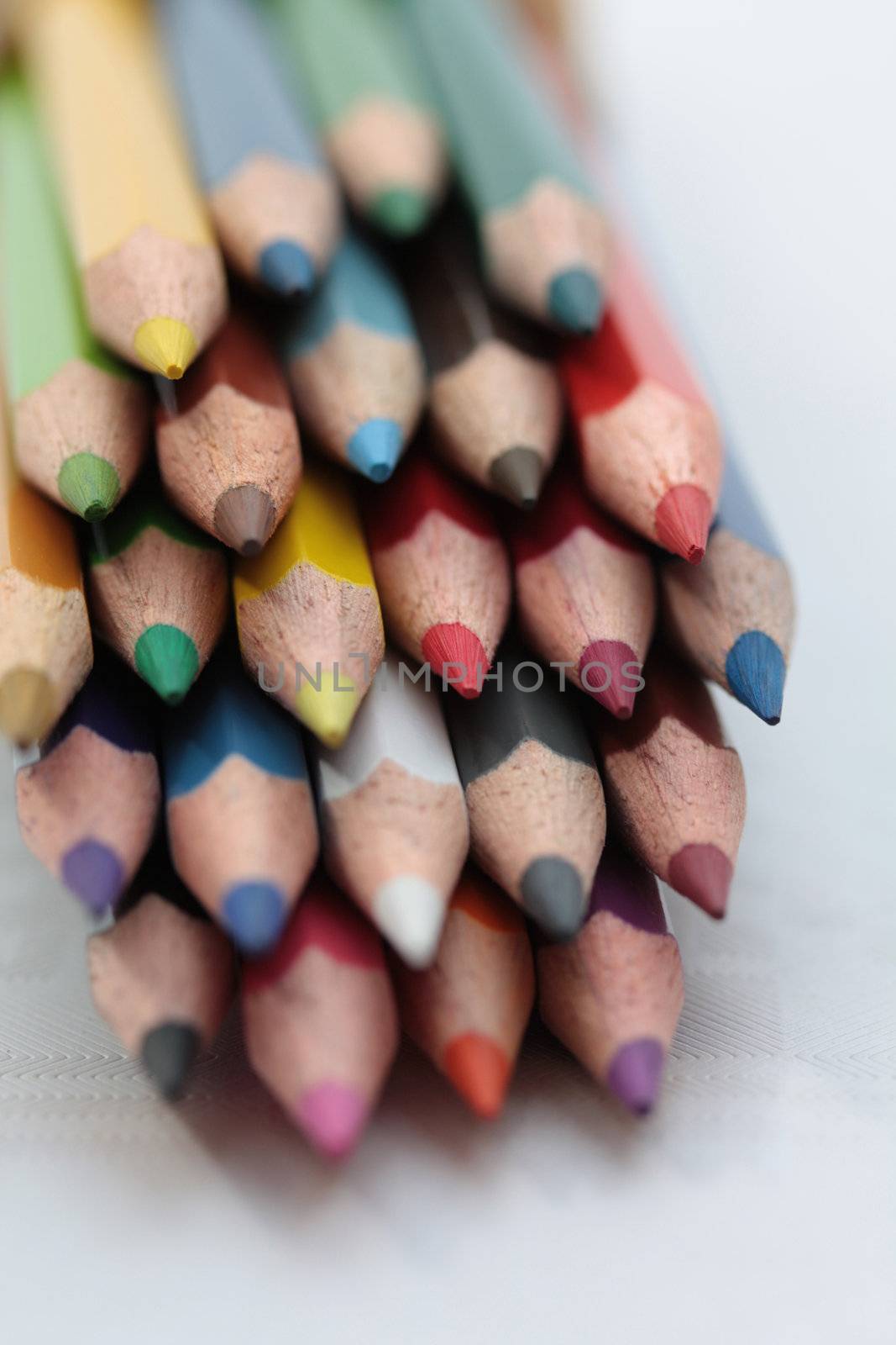 stack of colorpencils by studioportosabbia