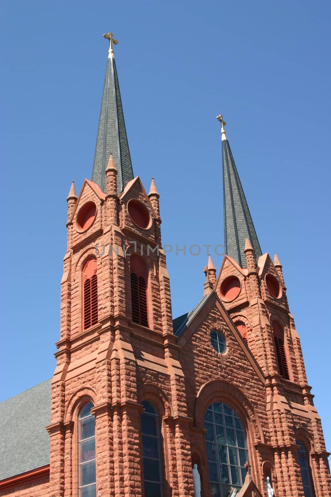 A corner view of St. Joseph’s Church looking up at the bell towers. 