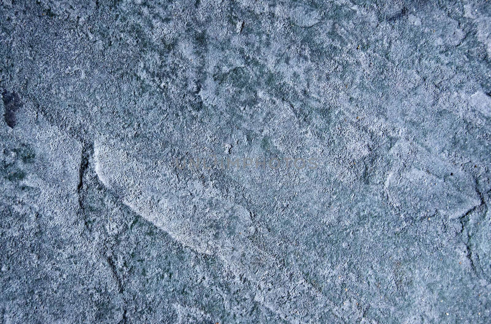 A closeup image of weathered grey stone, ideal for background
