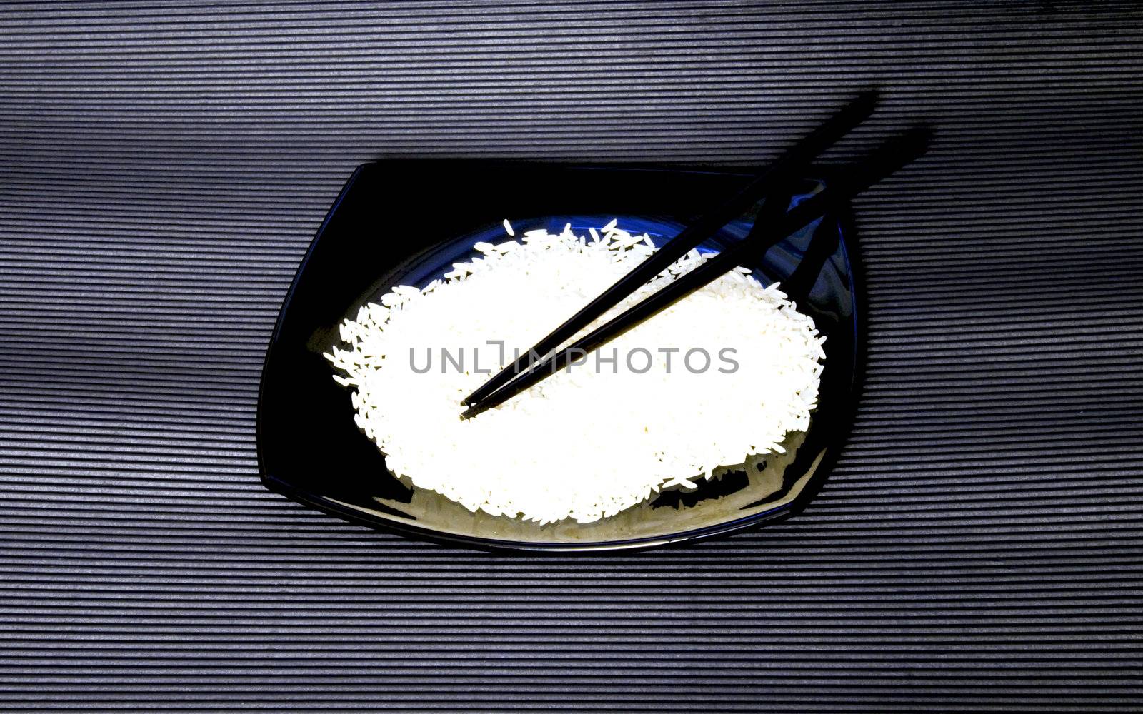 Close up of a plate full of white rice 