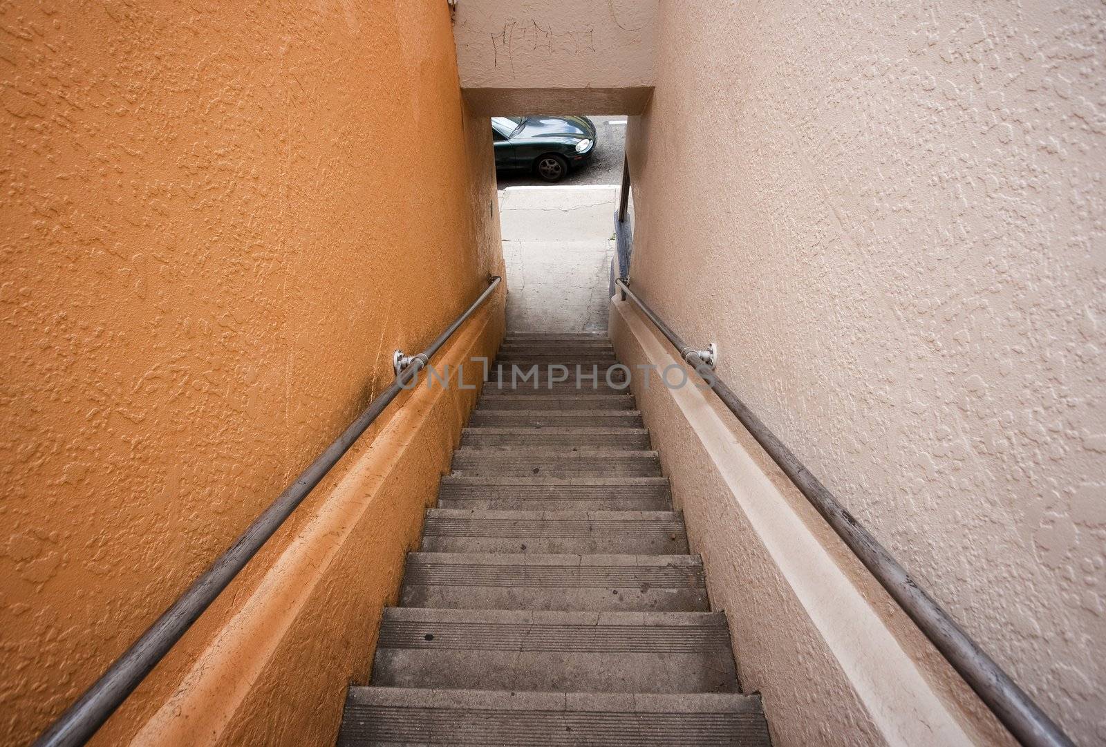 Long stairway to the street by Creatista