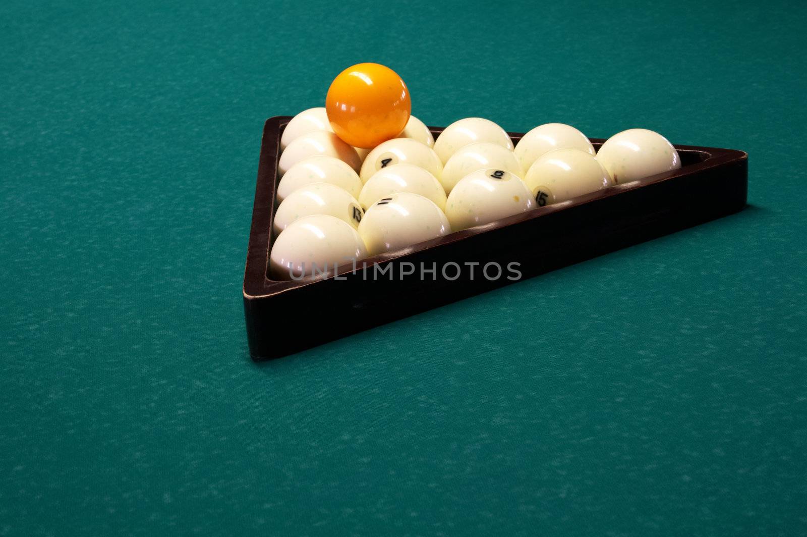 Billiard spheres in a triangle on a table