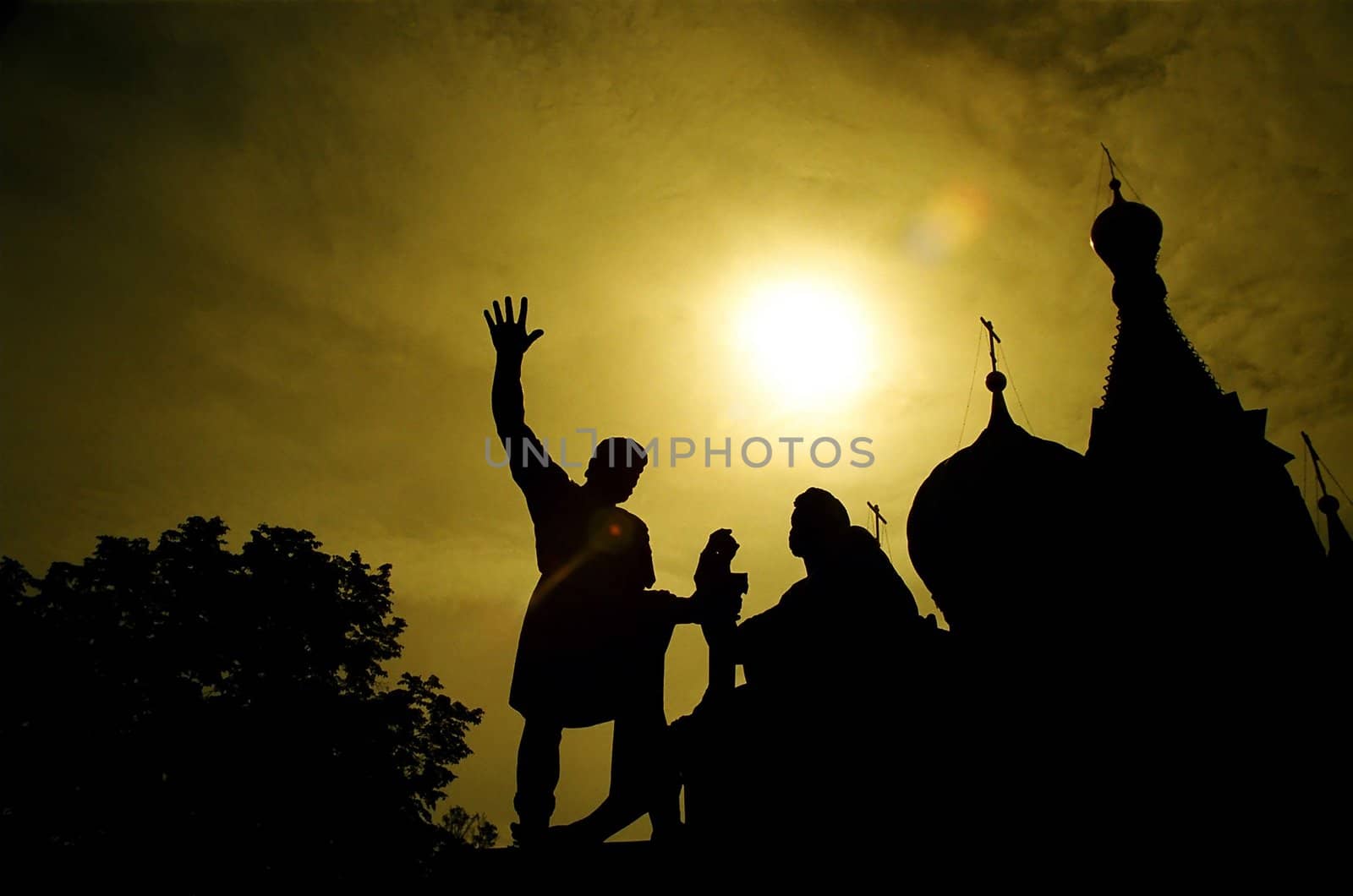 Silhouette of Minin and Pozharsky monument with St. Basil's cathedral, Moscow, Russia. Horizontal version.