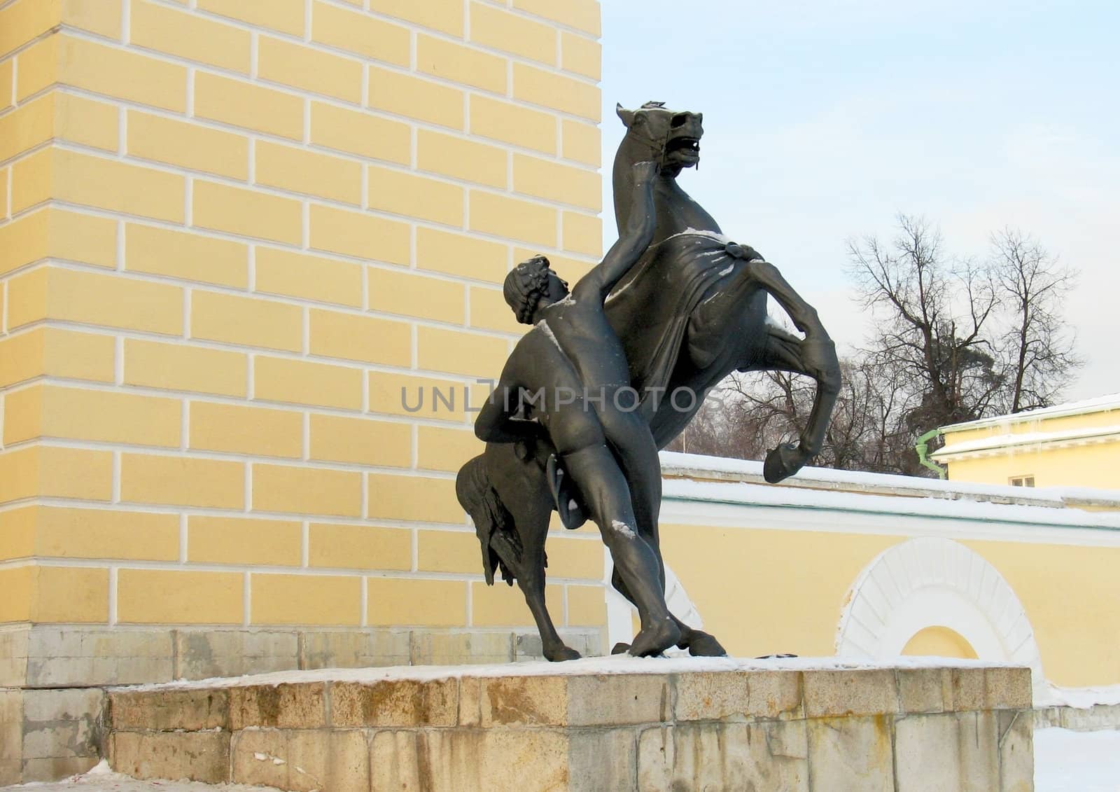 man and horse, statue in moscow park (winter)