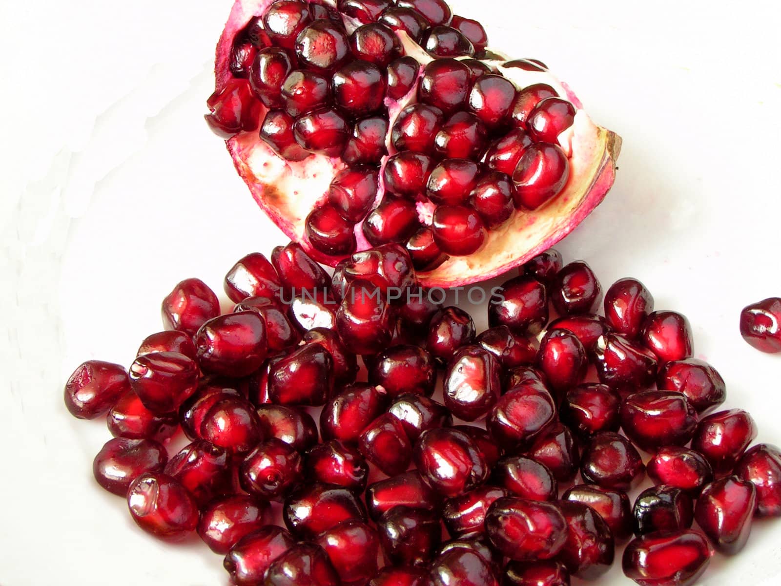 Pomegranate on a white background     