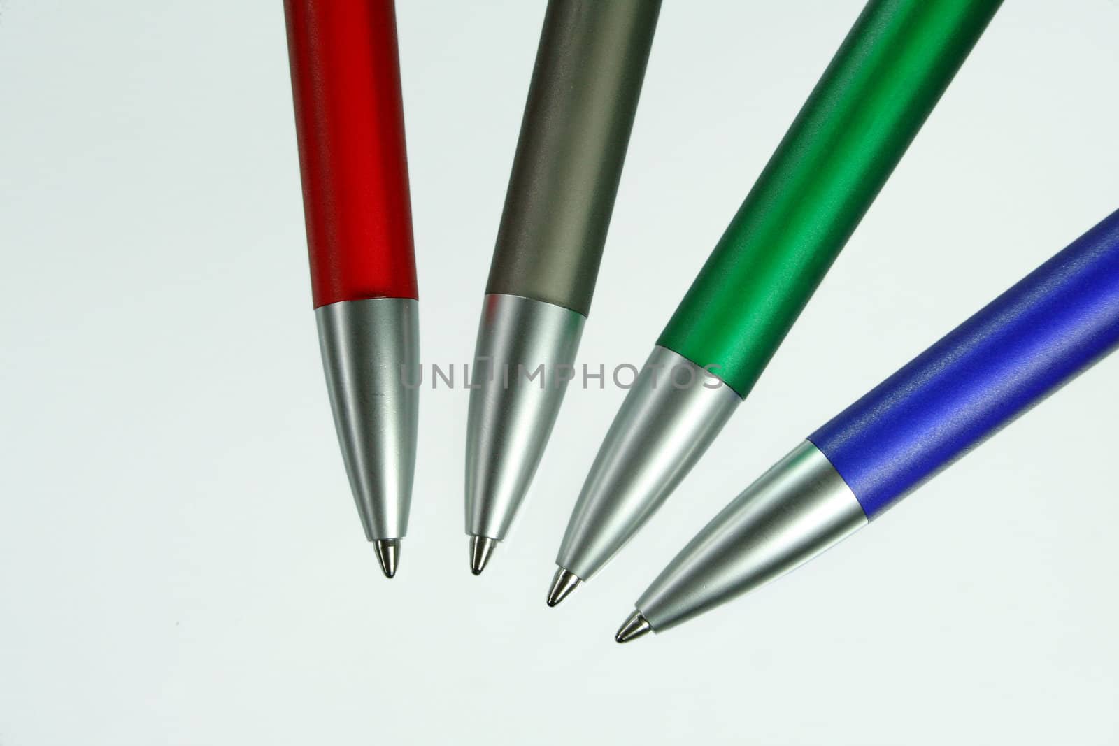 four pens in different colours for writings