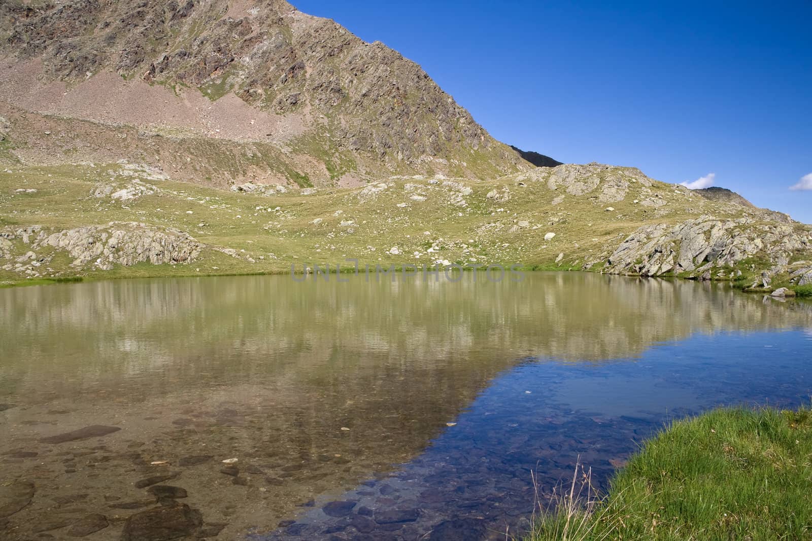 Lago Strino is a small italian alpine lake in val di sole, Trentino. Photo taken with polarizer filter