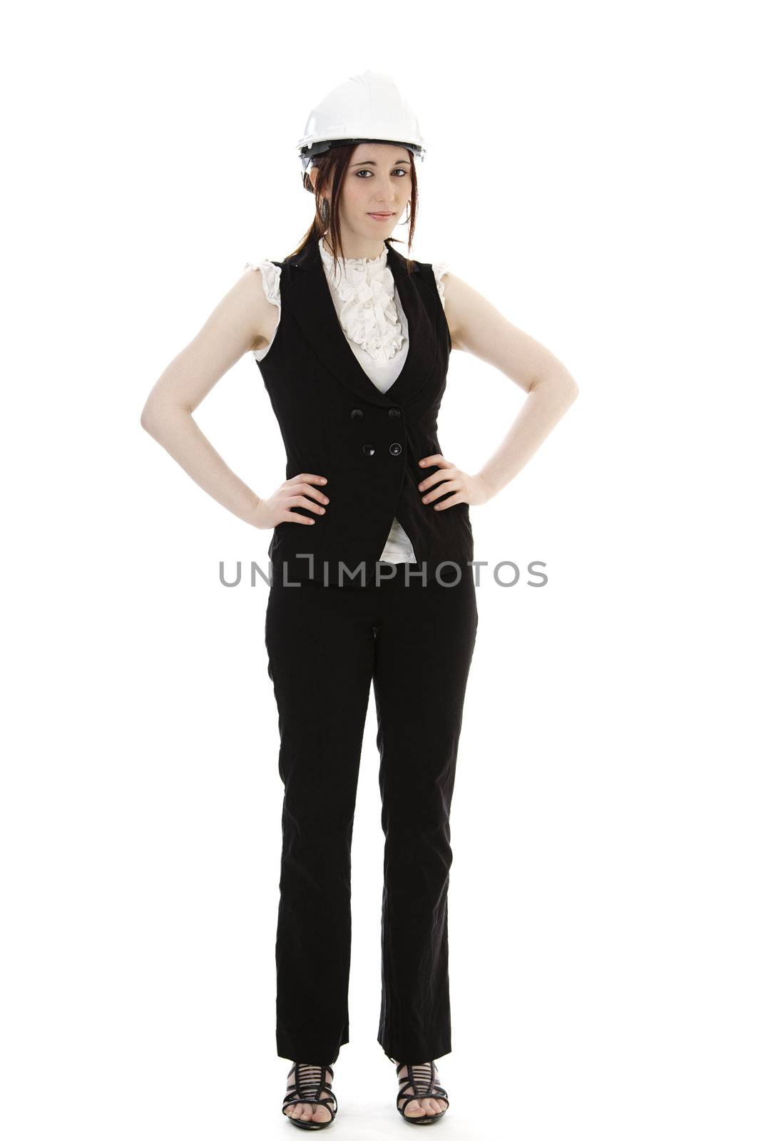 Young woman wearing a construction hat against a white background