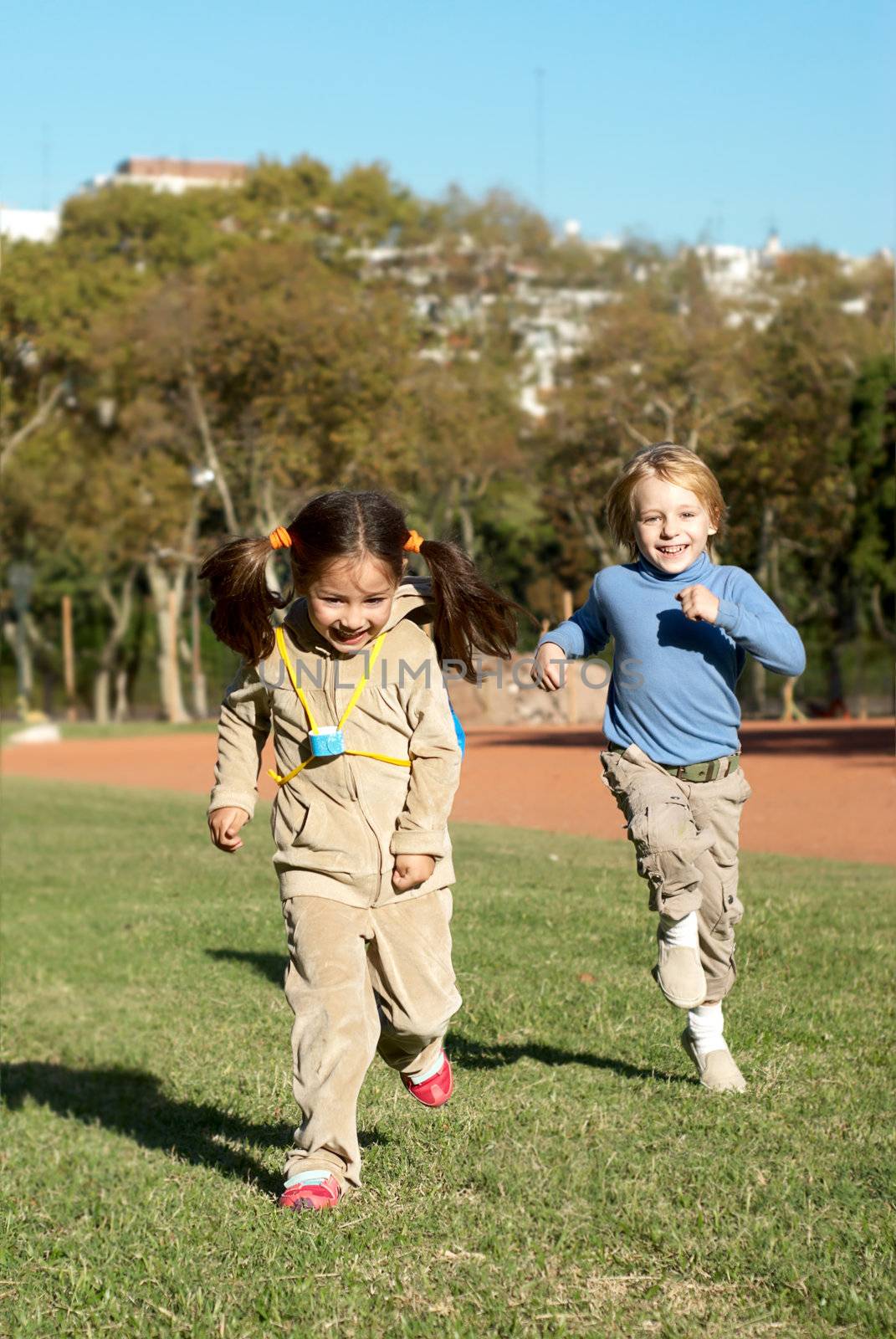 Children running in park