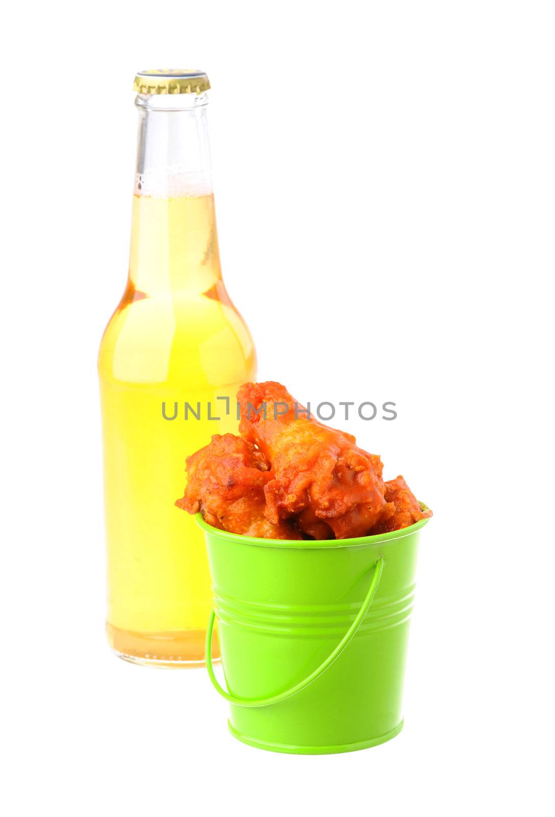 Small green bucket filled with spicy chicken wings.