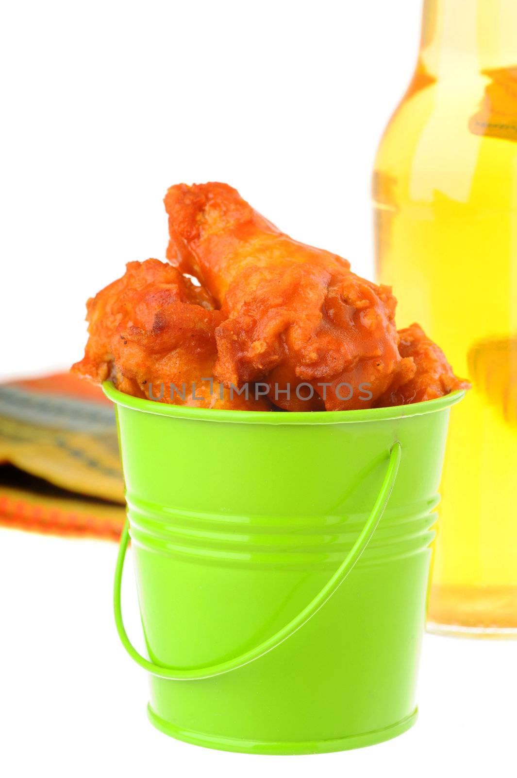 Bucket of hot and spicy chicken wings.