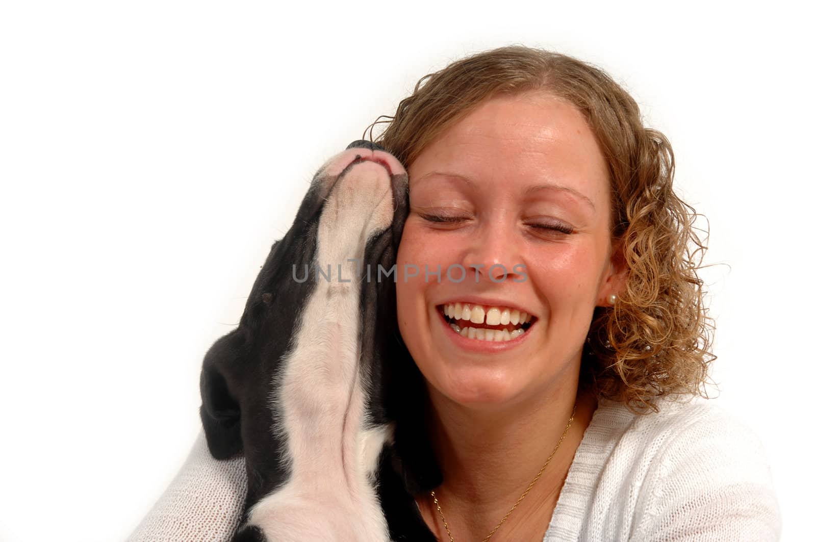 Young happy woman and her puppy dog.