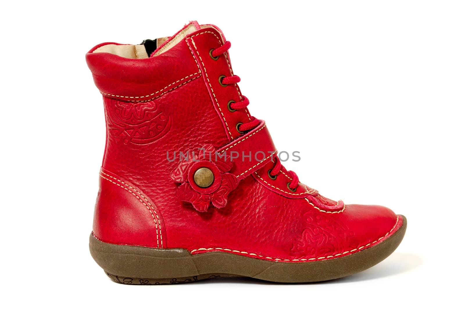 A red shoe. Taken on a clean white background.