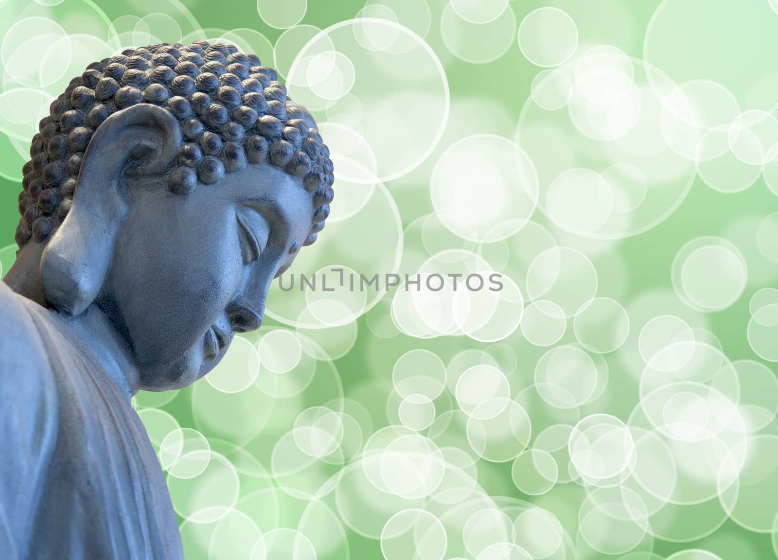 Bronze Zen Buddha Statue Meditating with Blurred Background