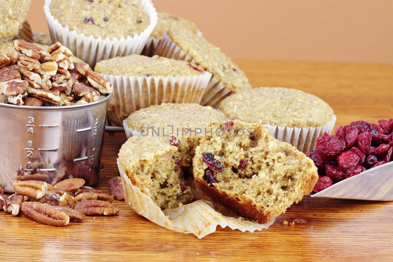 Oatmeal Cranberry Muffins made with dried cranberries, oats, whole wheat flour, pecans and dried cranberries.