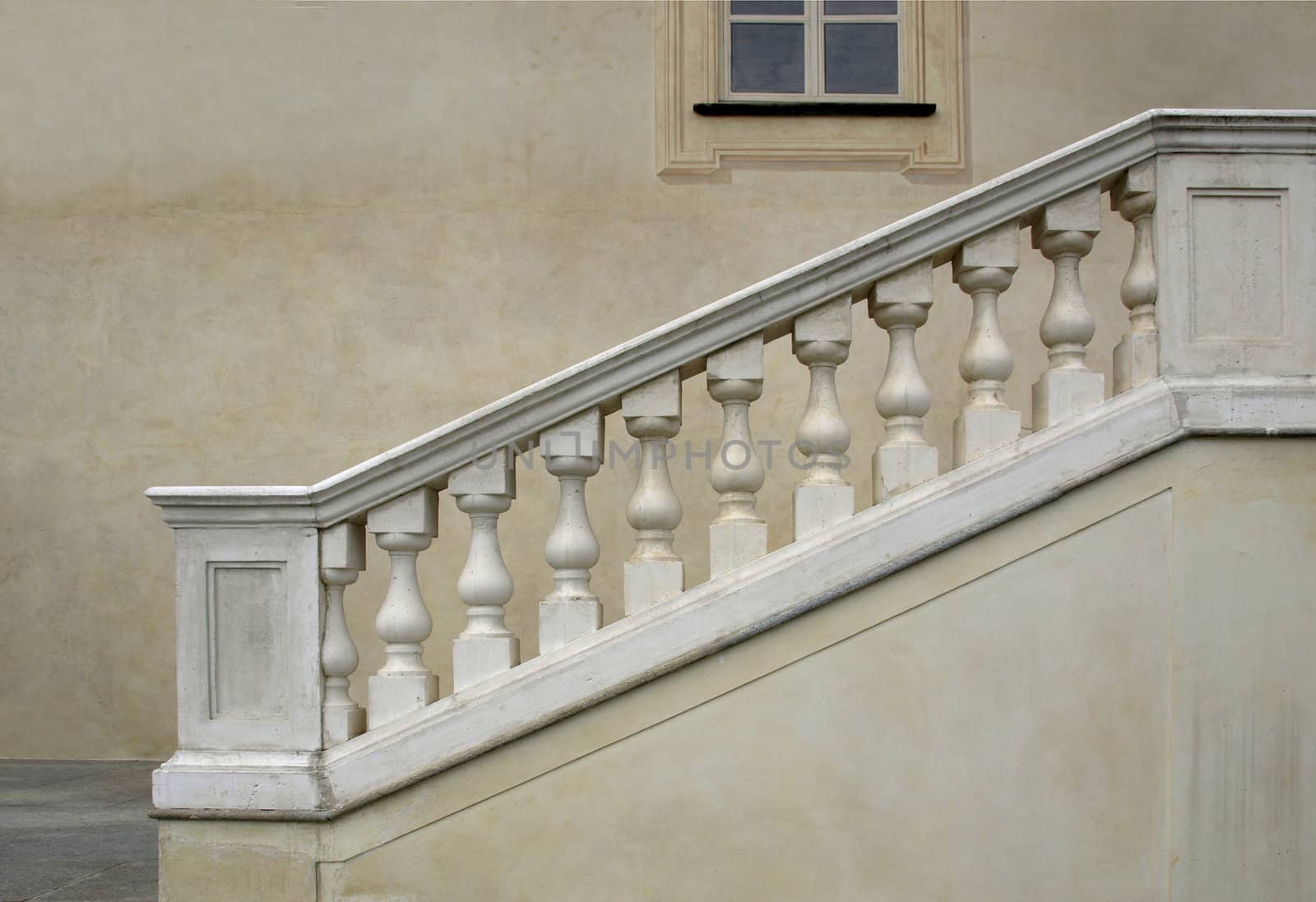 Stone baroque balaustrade as a staircase handrail