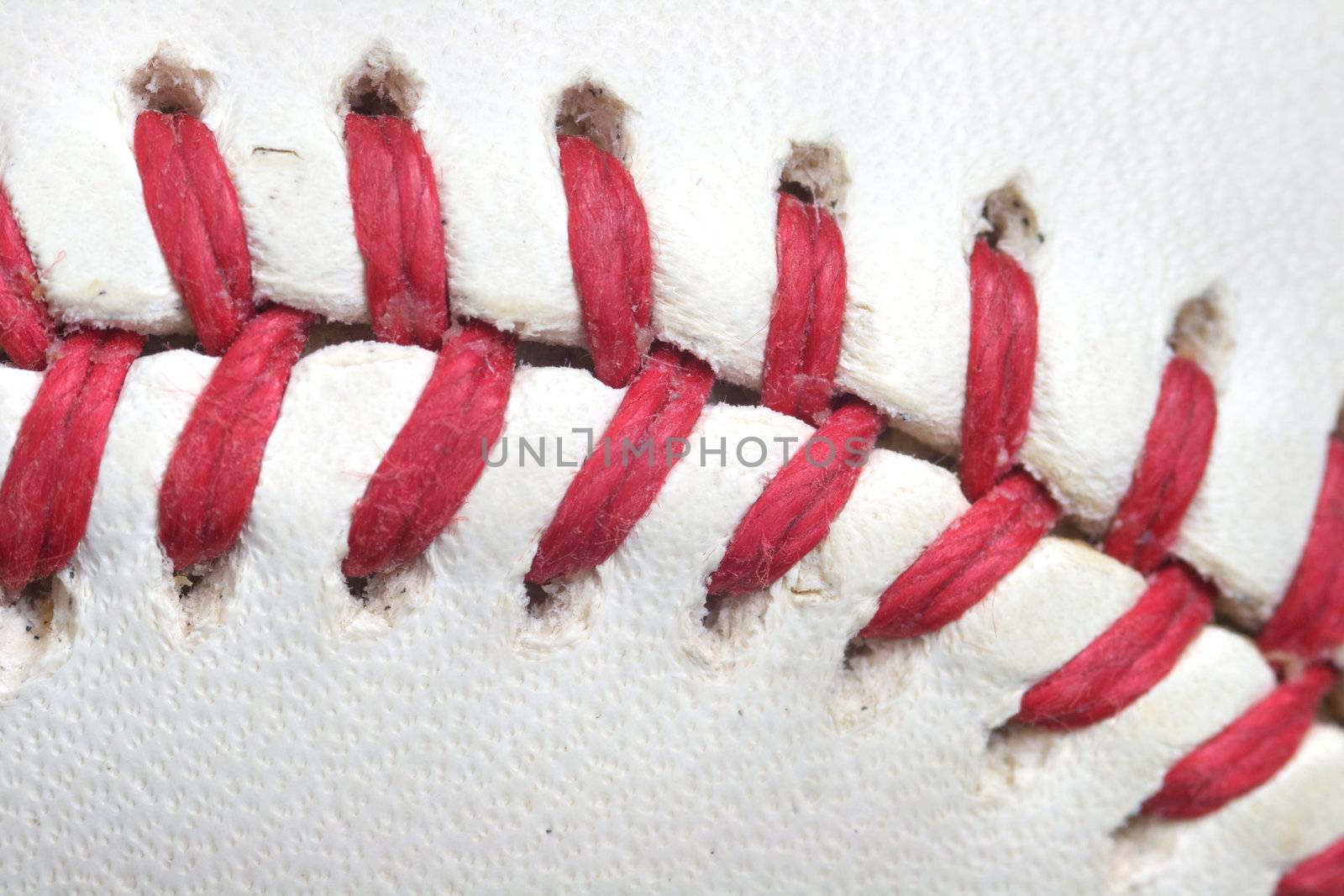 Stunning macro of a baseball.  So close you can see the wax on the threads.