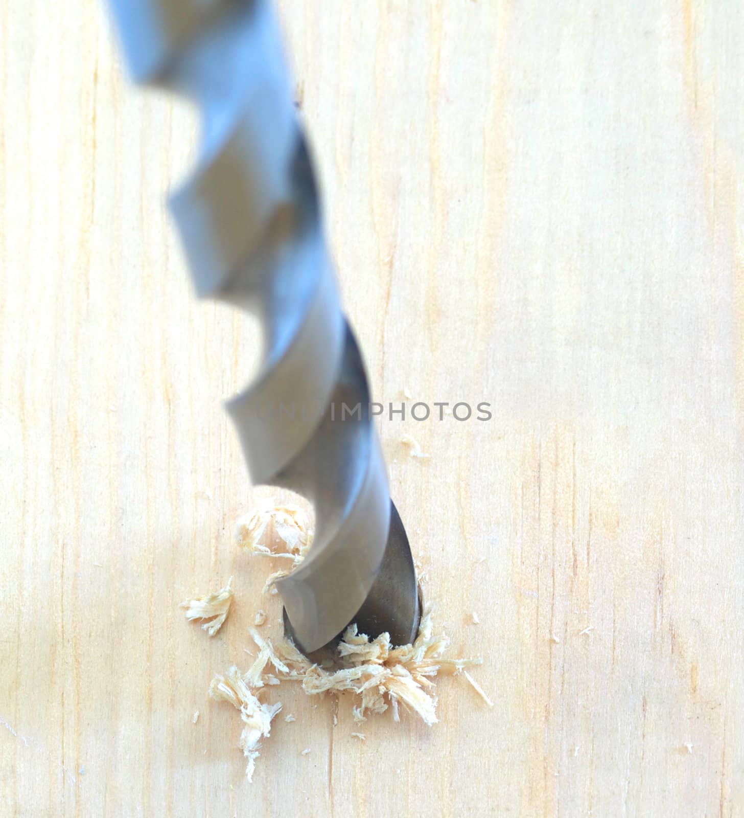 Drilling through a piece of southern yellow pine