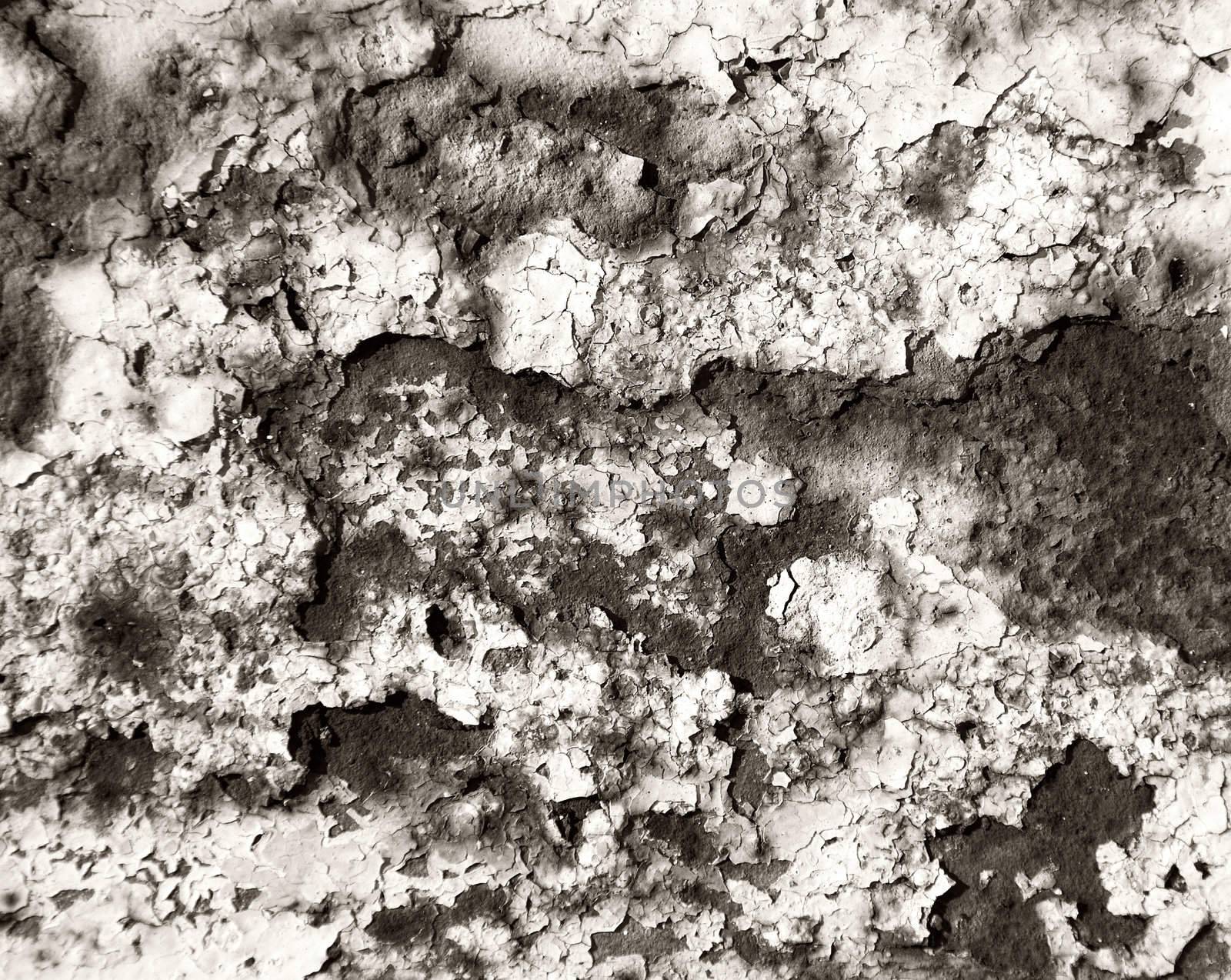 Painted wall with cracks monochrome background