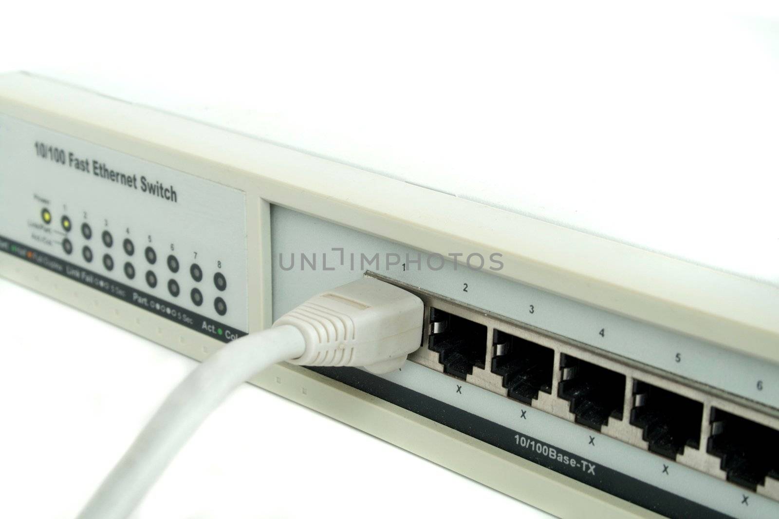 Close up of a network cable plugged into a switch.