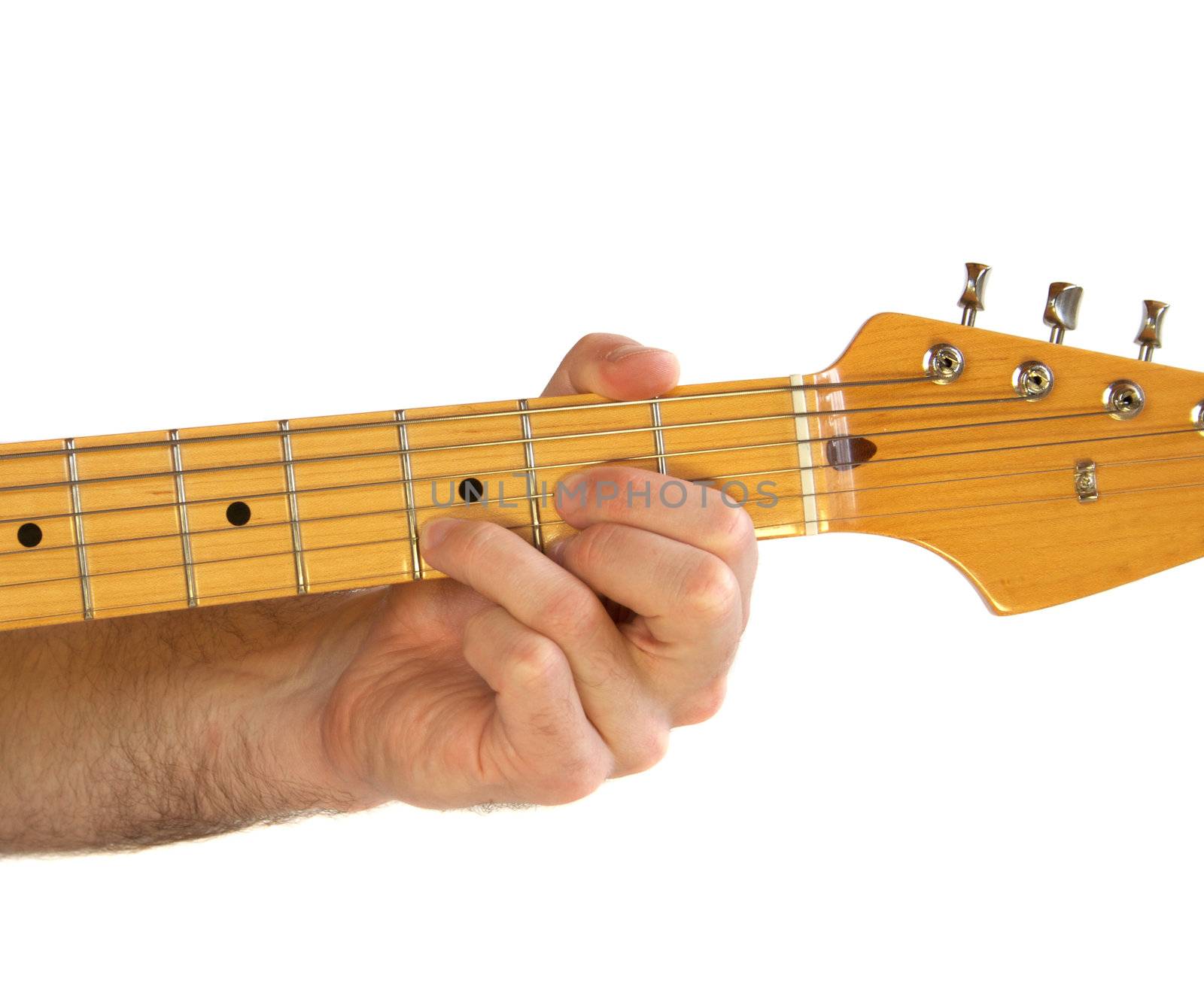 Demonstration of how to play a D chord on the guitar