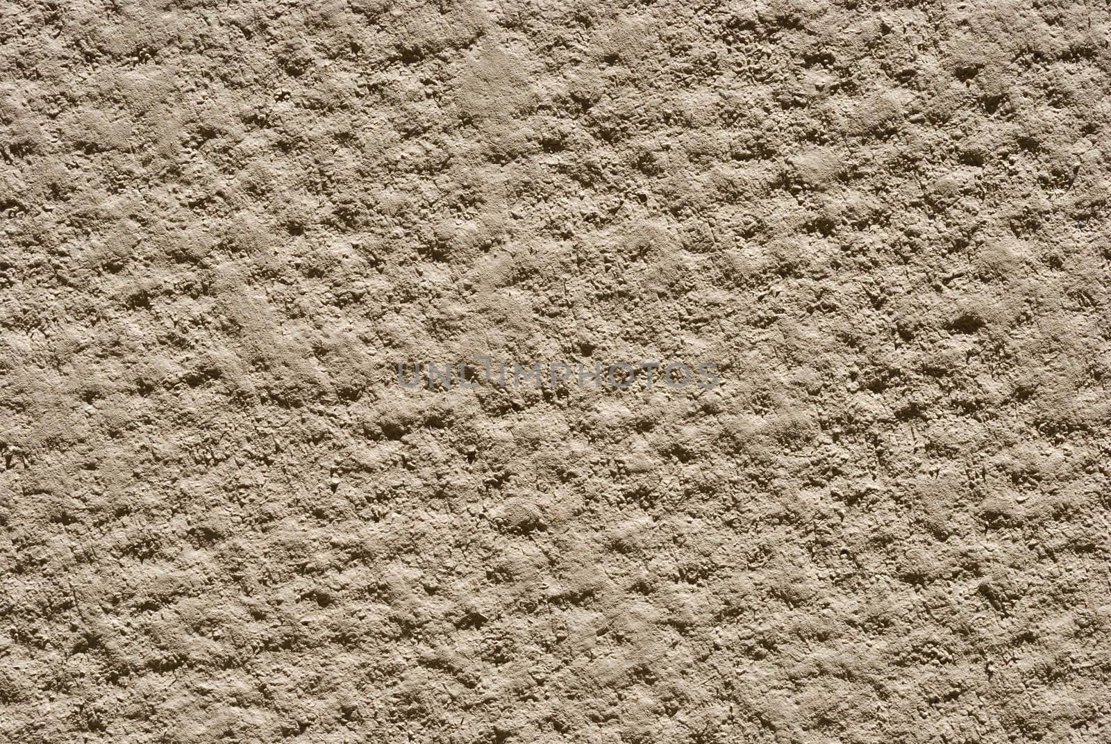 Close up of a wall painted beige.