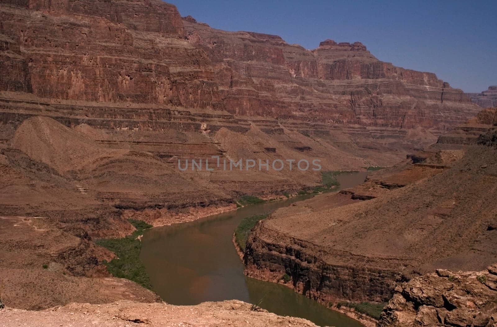 Red lifeless rocks and river in national park Grand Canyon