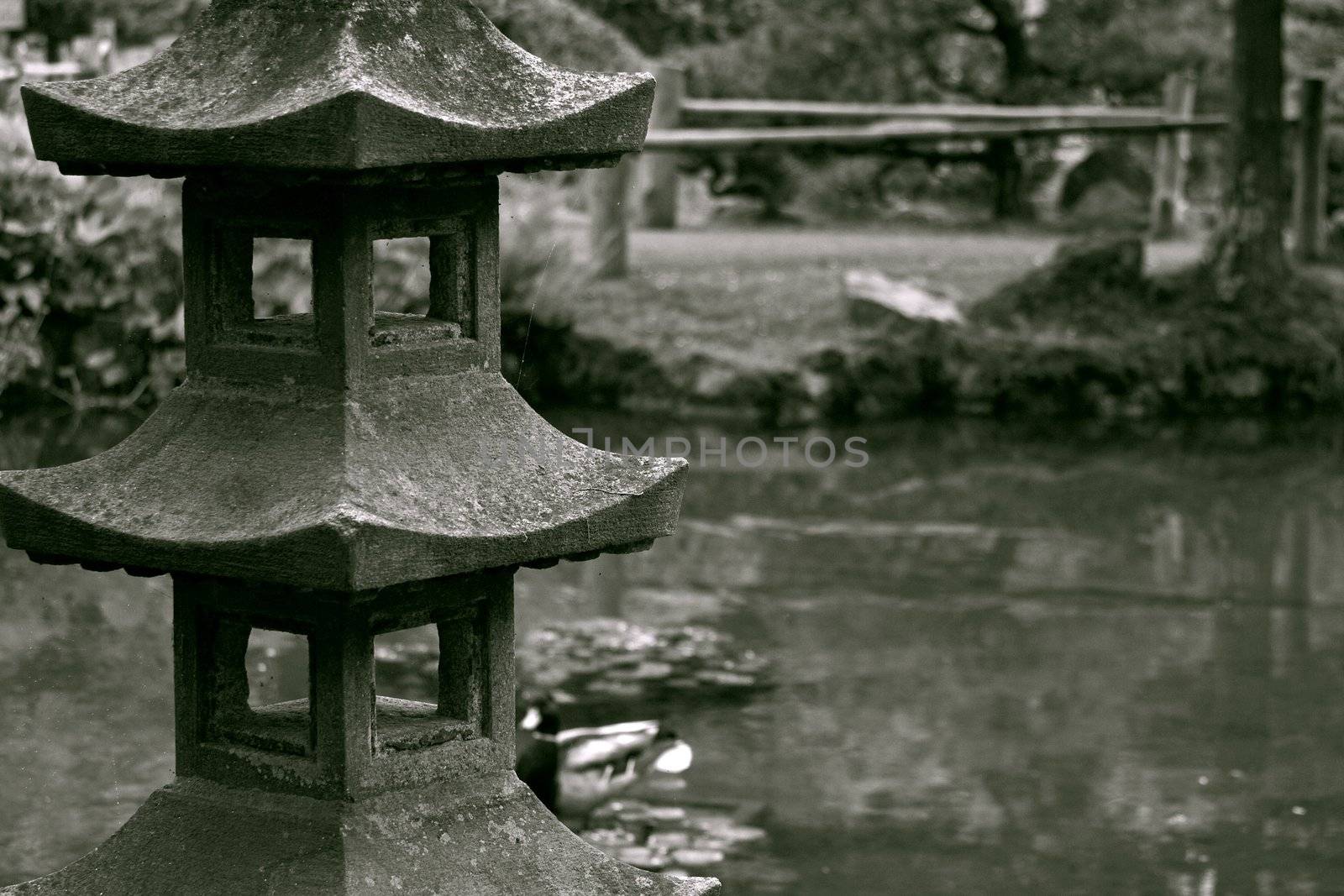 Vintage photo of stoned sculpture in a japanese garden