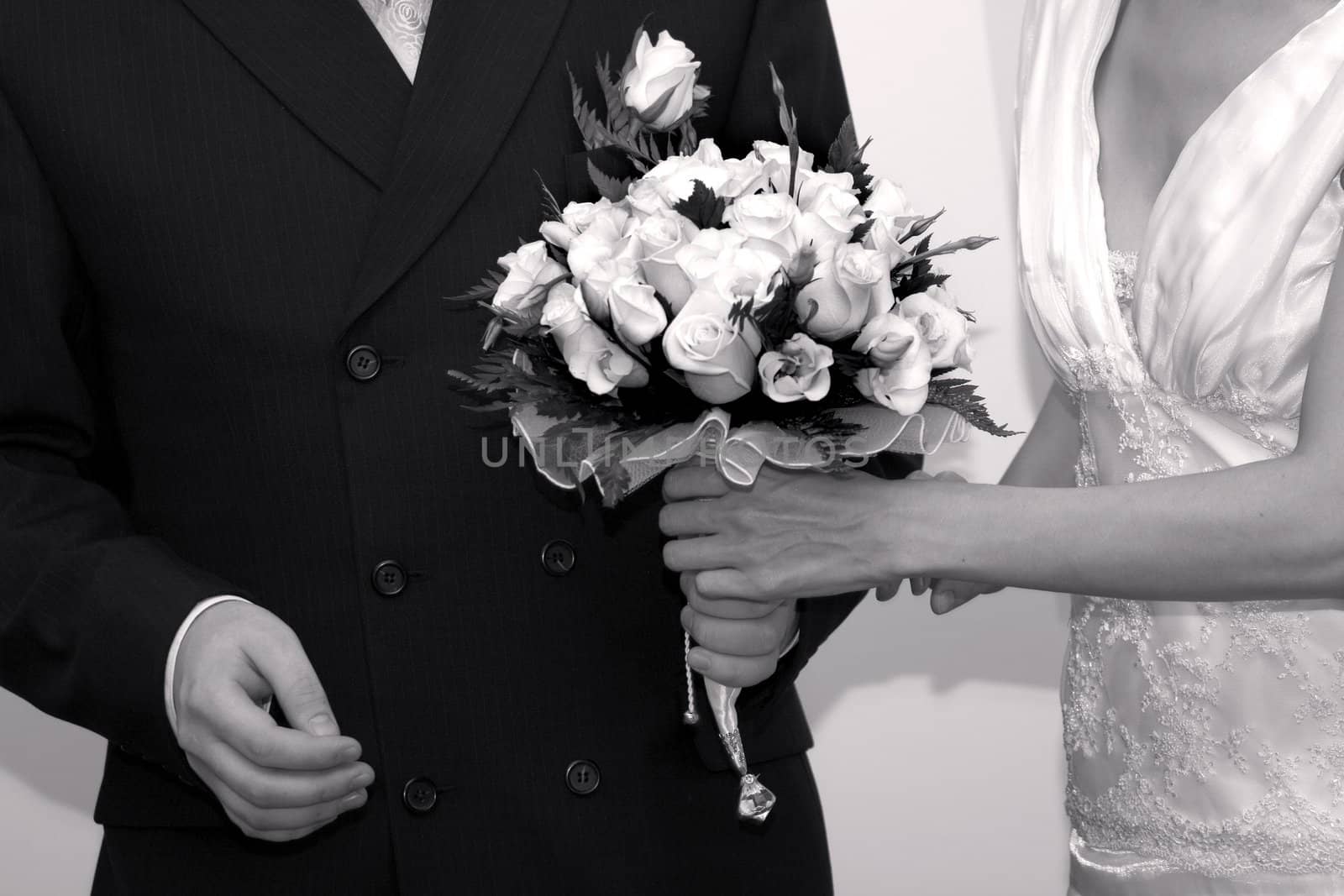 Bride and groom with a wedding bouquet