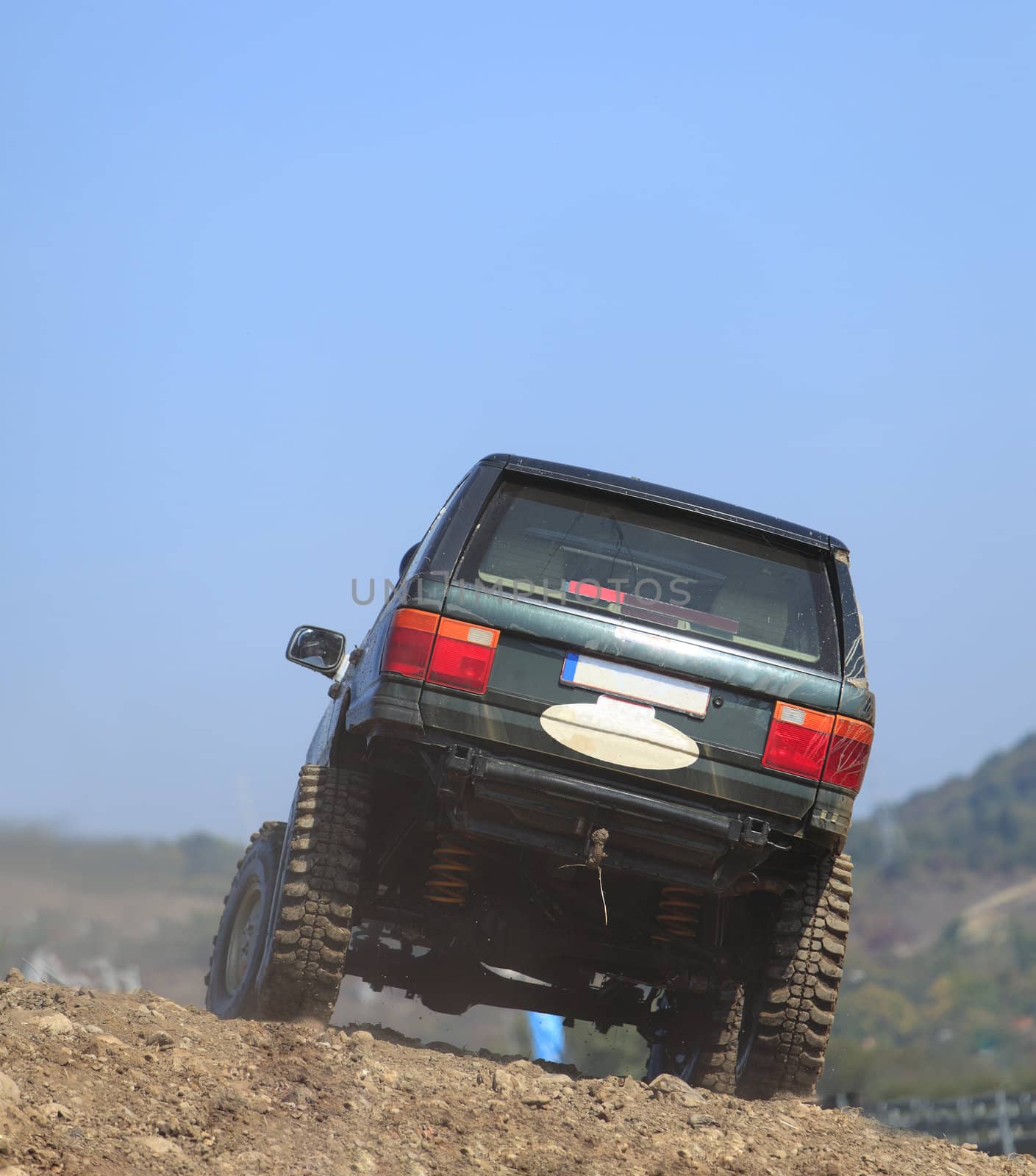 Truck driving on a very difficult off-road route.