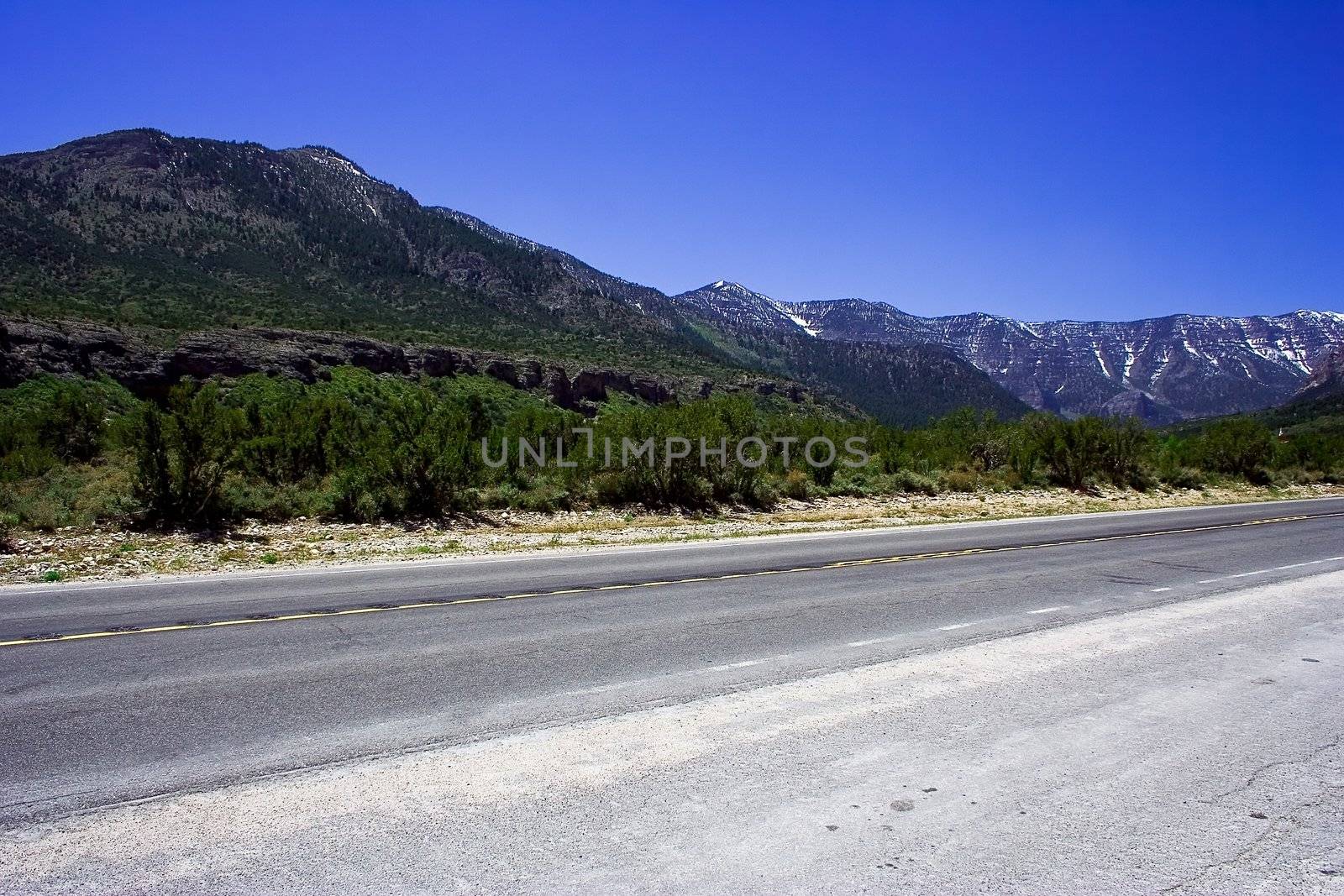 Empry freeway among the mountains in america