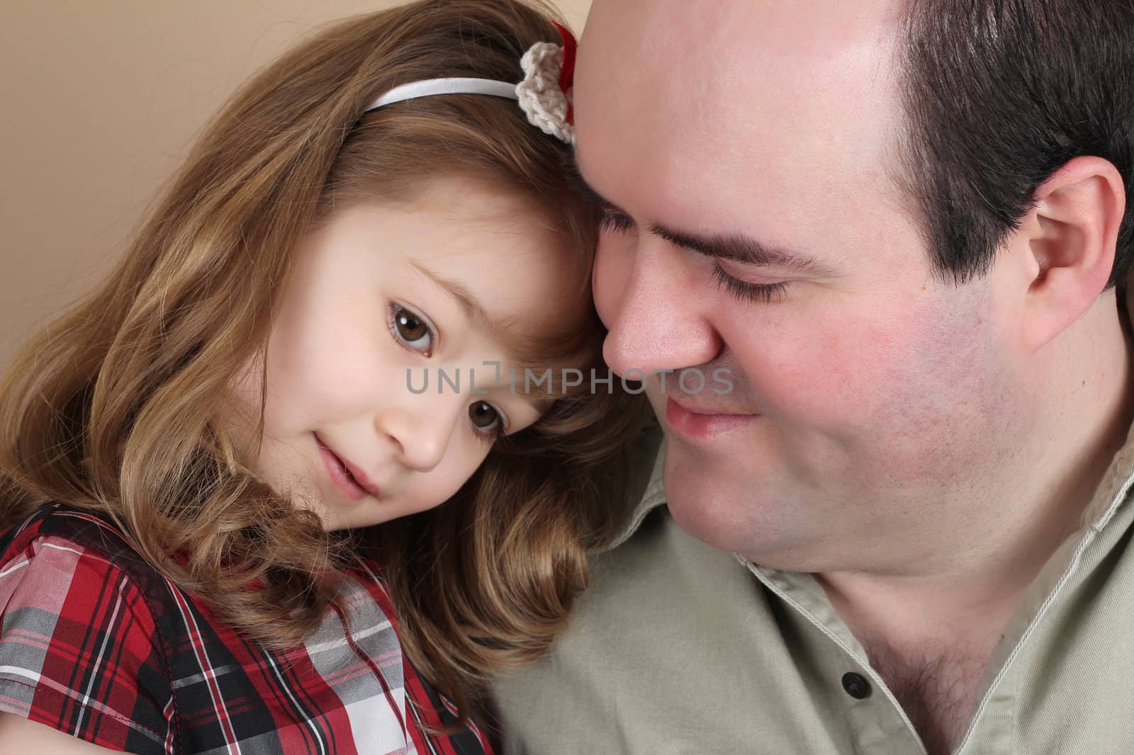 Portrait of a beautiful girl and her father