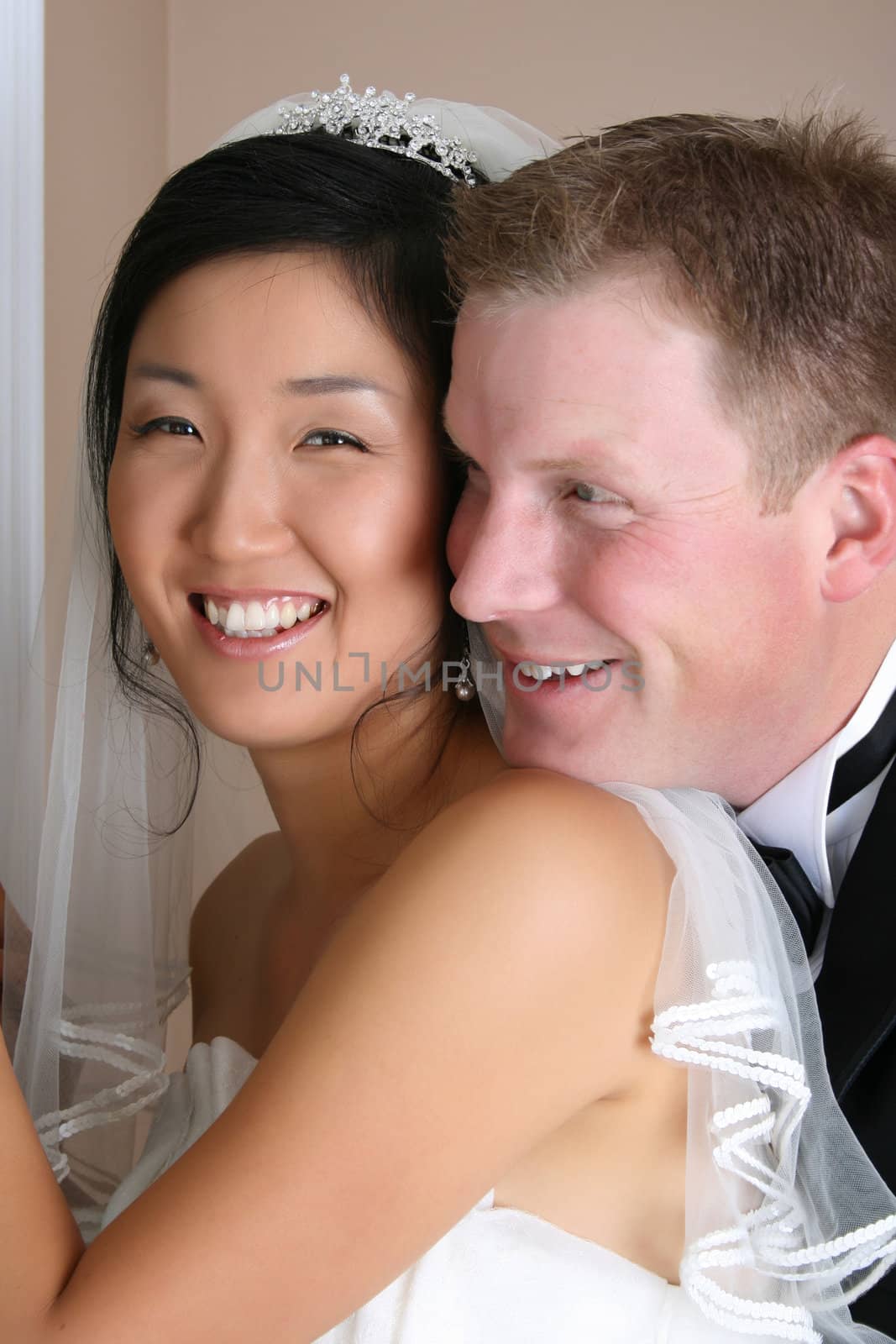 Beautiful couple on their wedding day in traditional attire