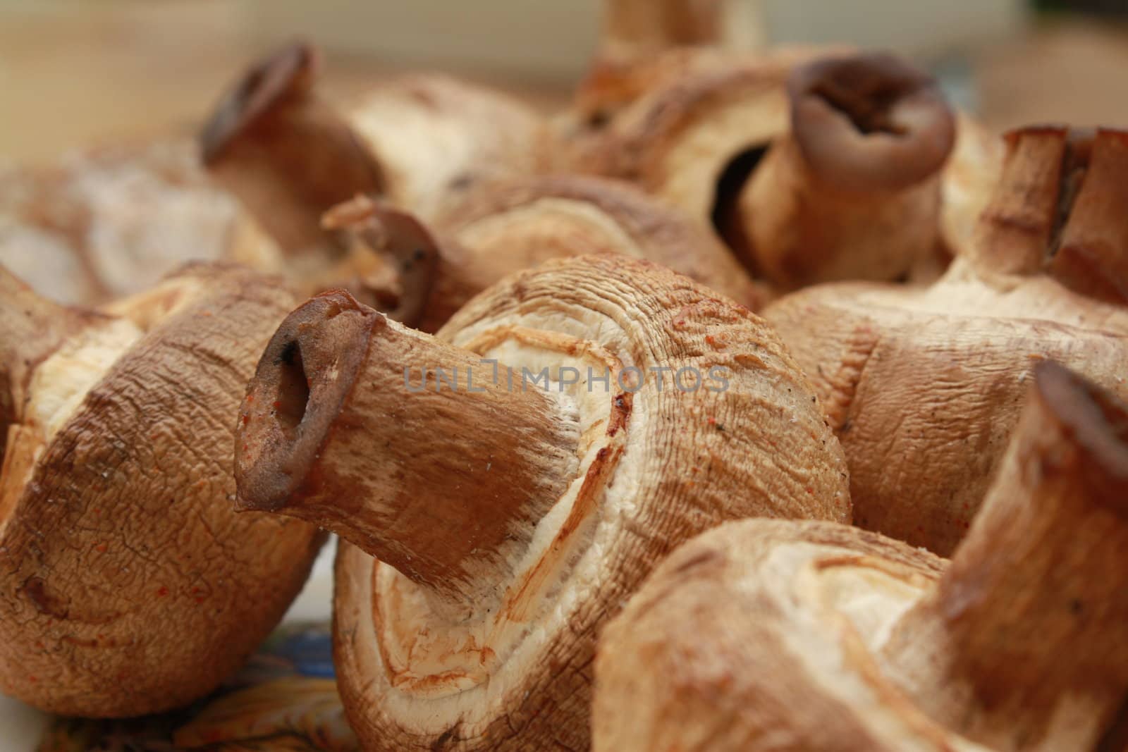 Champignons fried on a brazier. Appetizing dish.