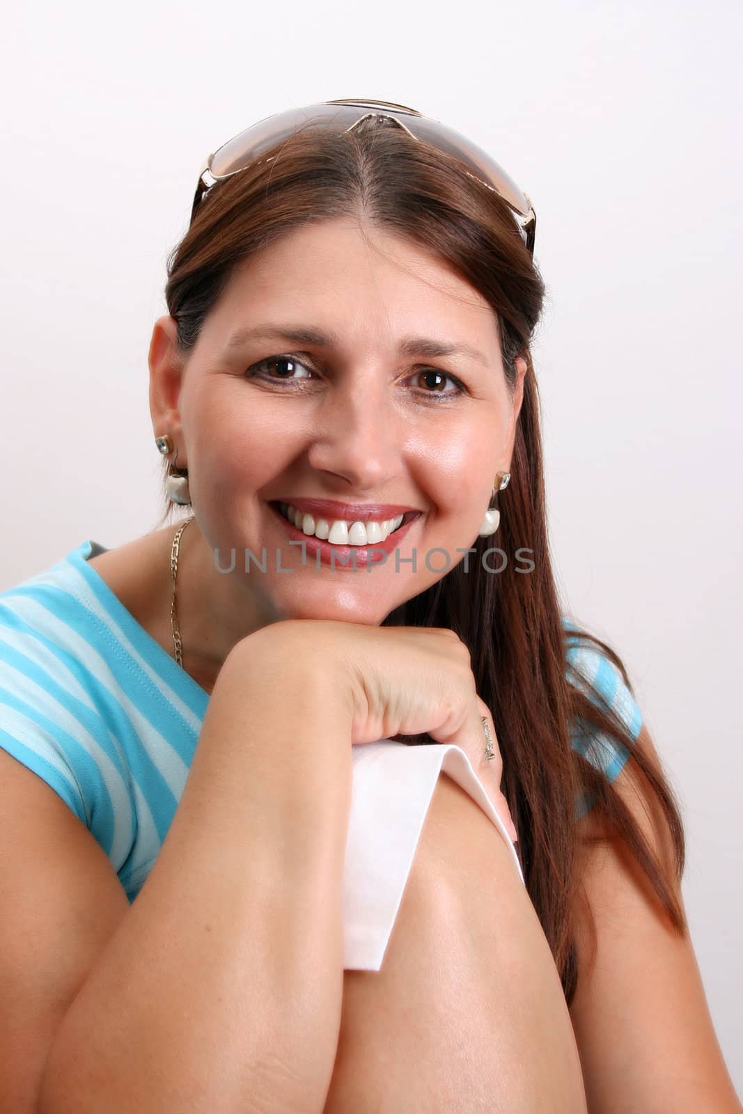 Adult Female Model wearing a blue striped top