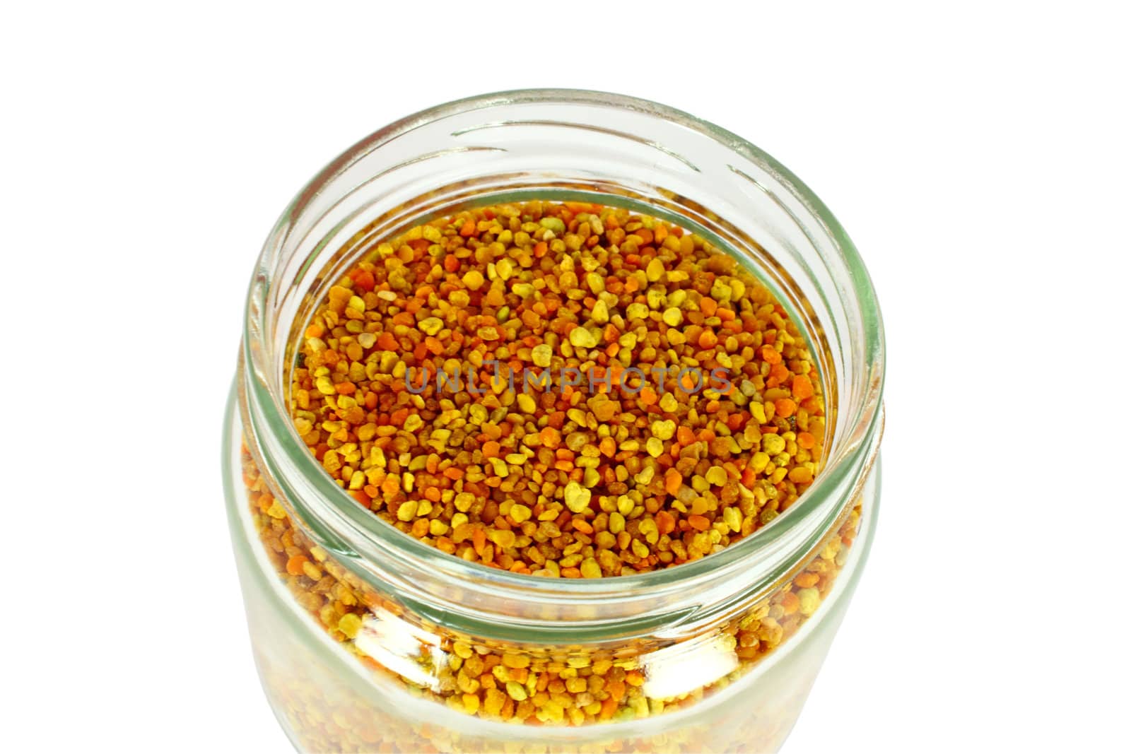 Bee pollen in glass jar isolated on white
