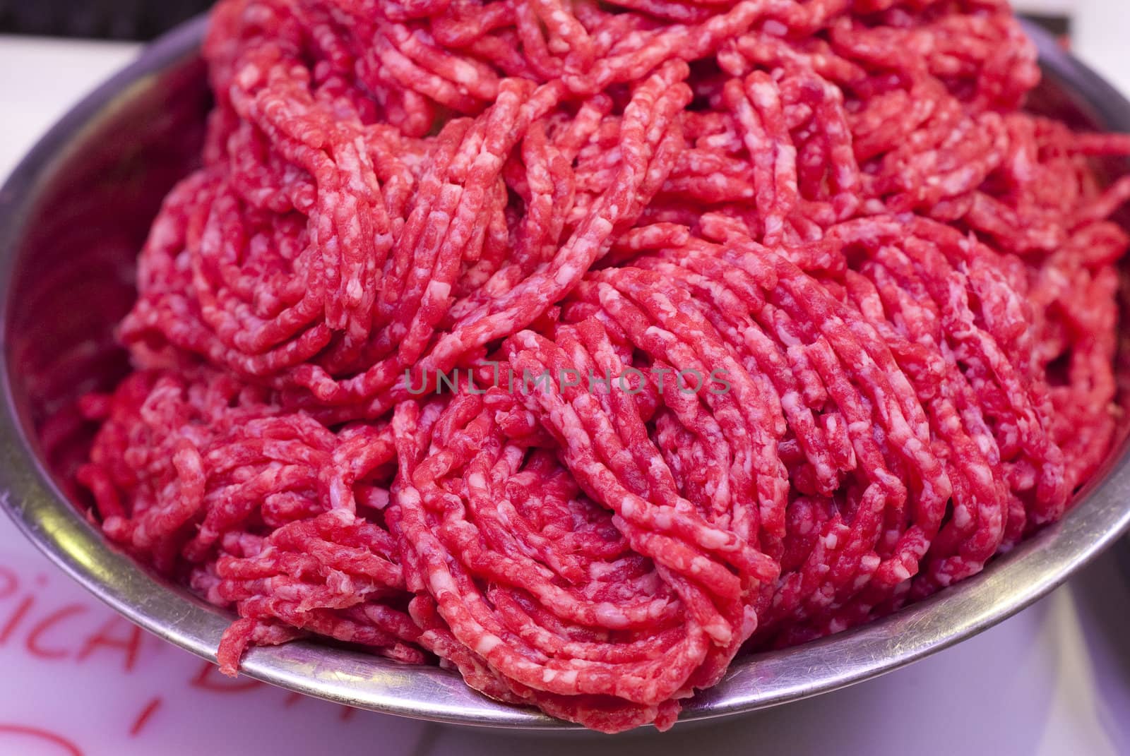 Mincemeat in bowl in butchers stall
