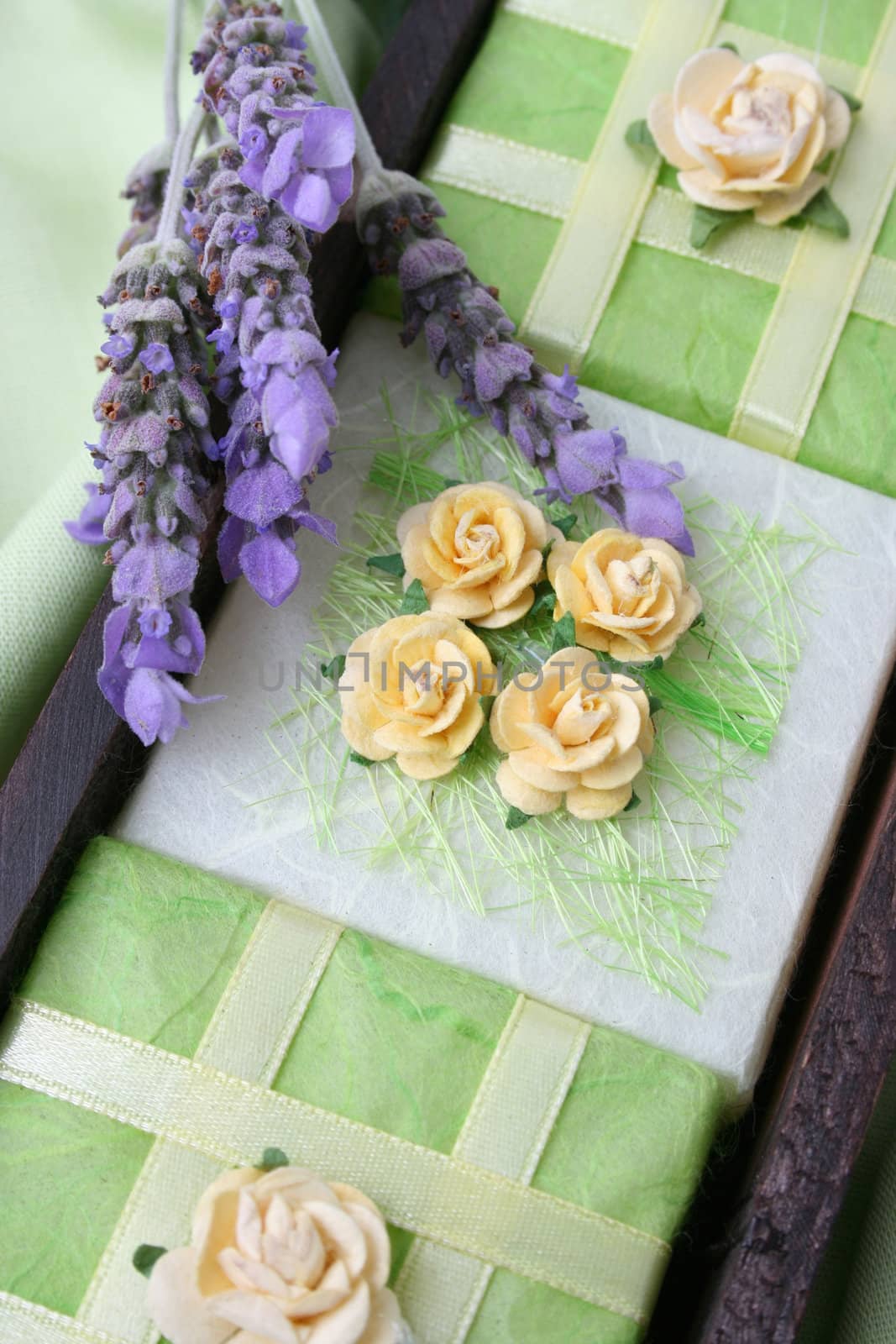 Soap Crate gift set wrapped in green, decorated with roses