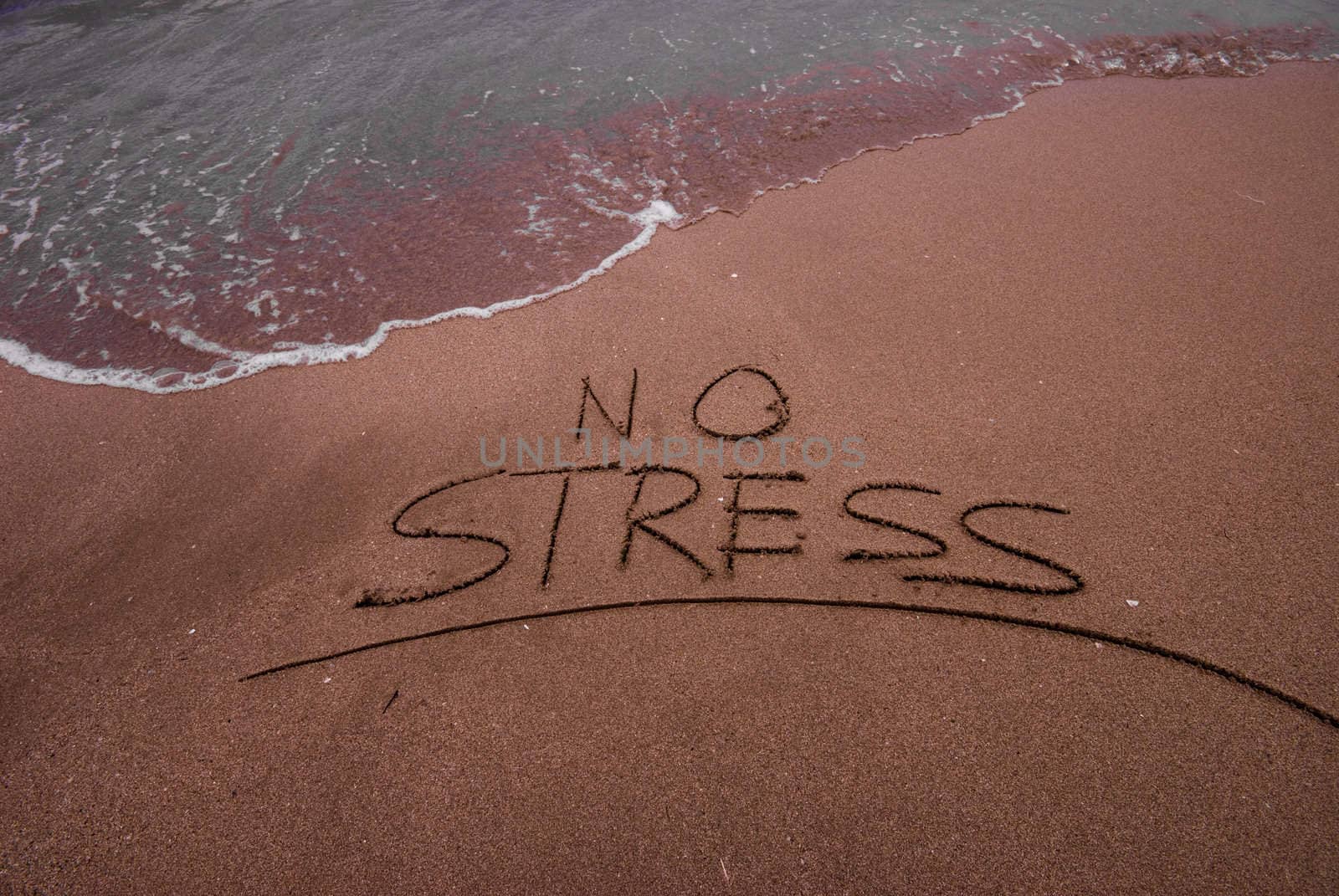 No stress inscription in sand on the beach